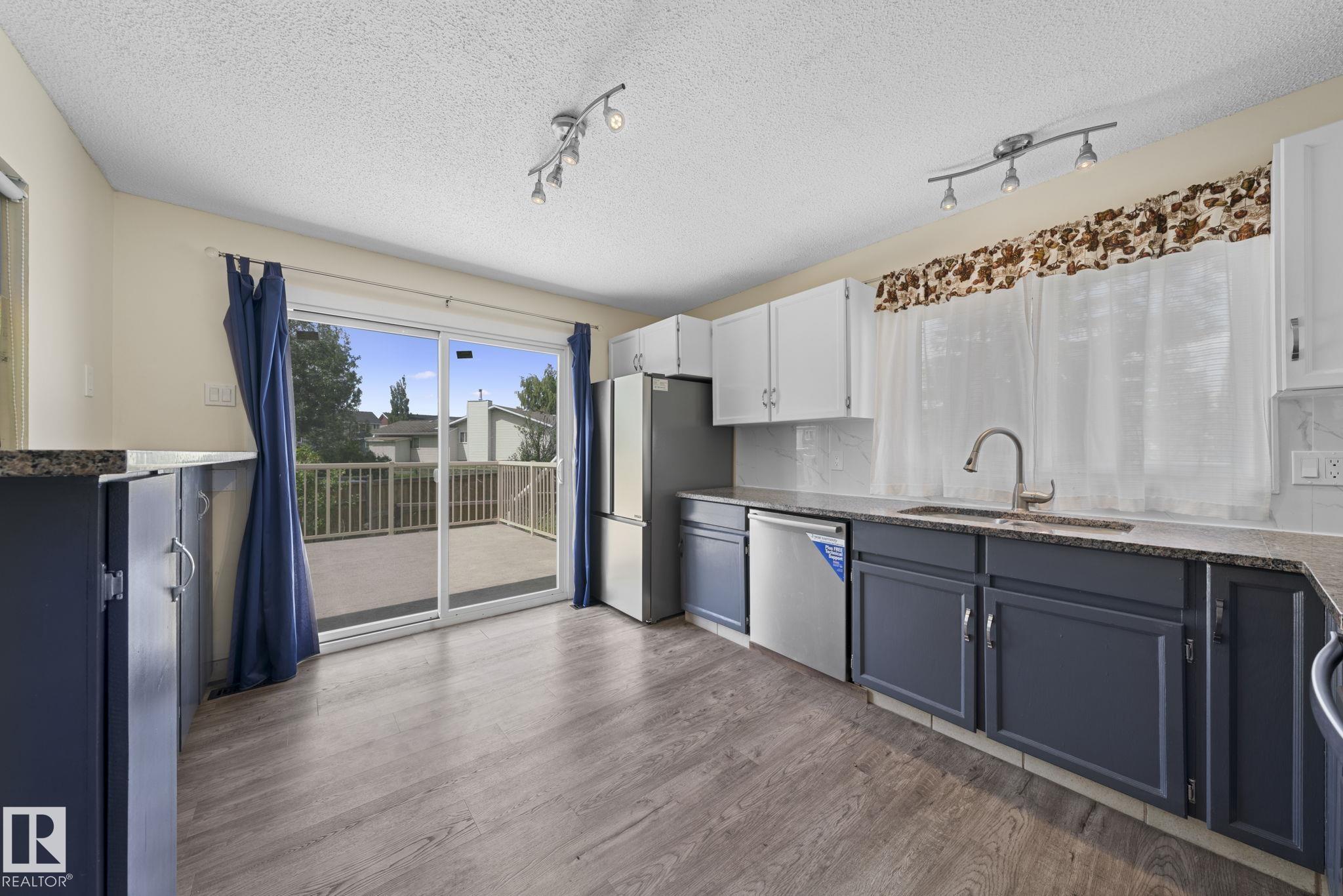 Photo 19 at 10458 14 Avenue NW, Bearspaw, Edmonton