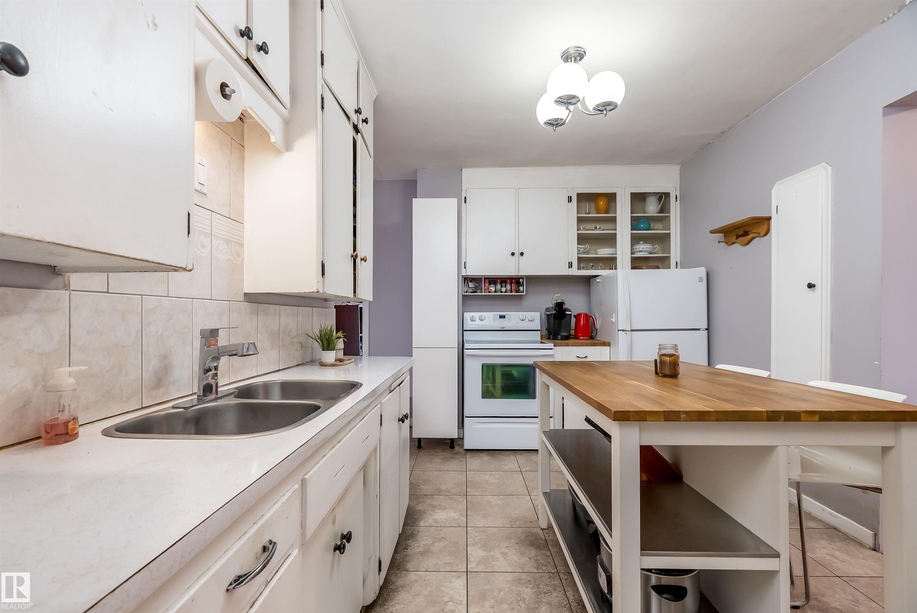 Photo 11 at 4426 53 Avenue, North Telford, Leduc