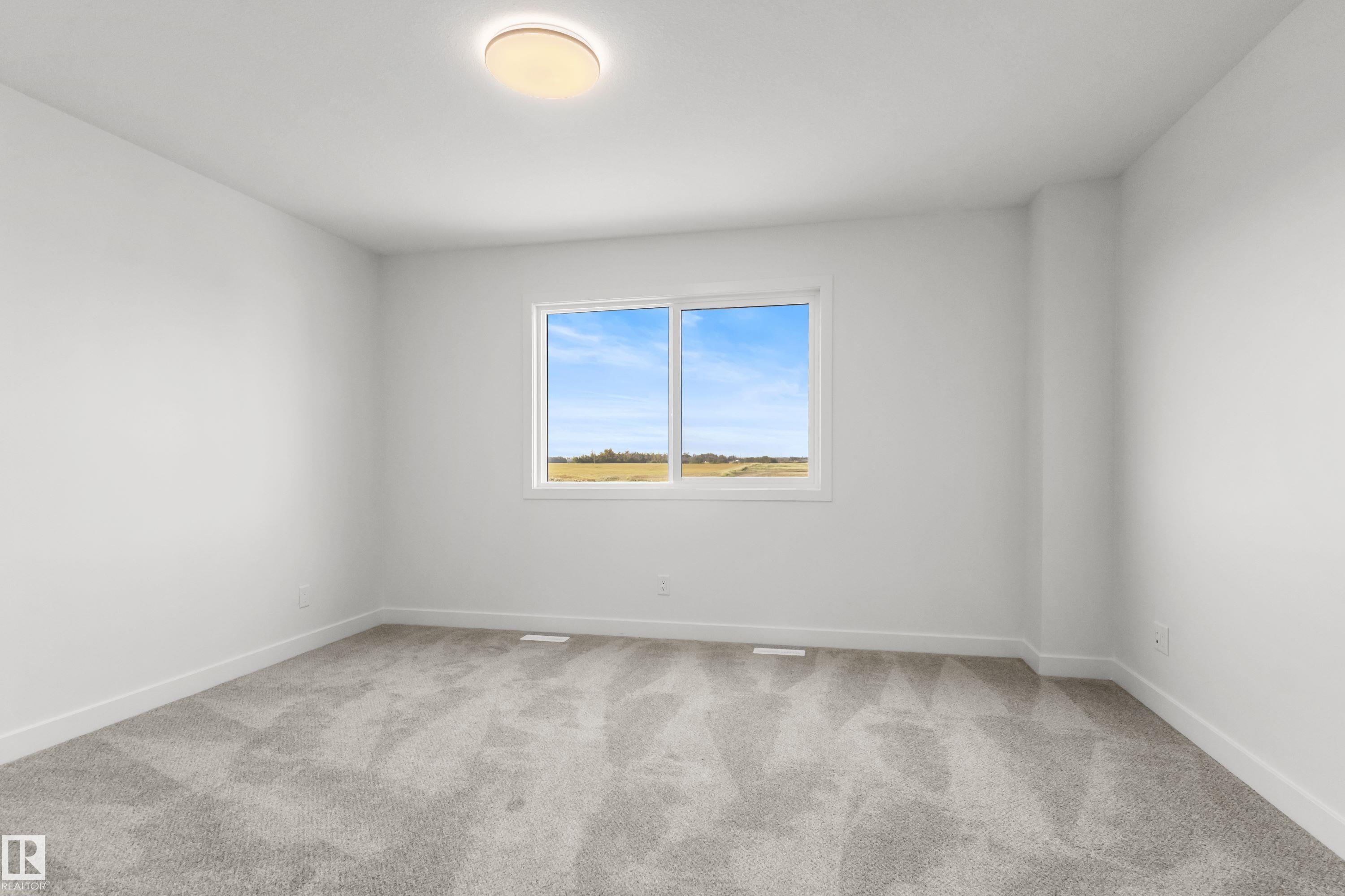 Photo 7 at 2124 Muckleplum Crescent SW, The Orchards At Ellerslie, Edmonton