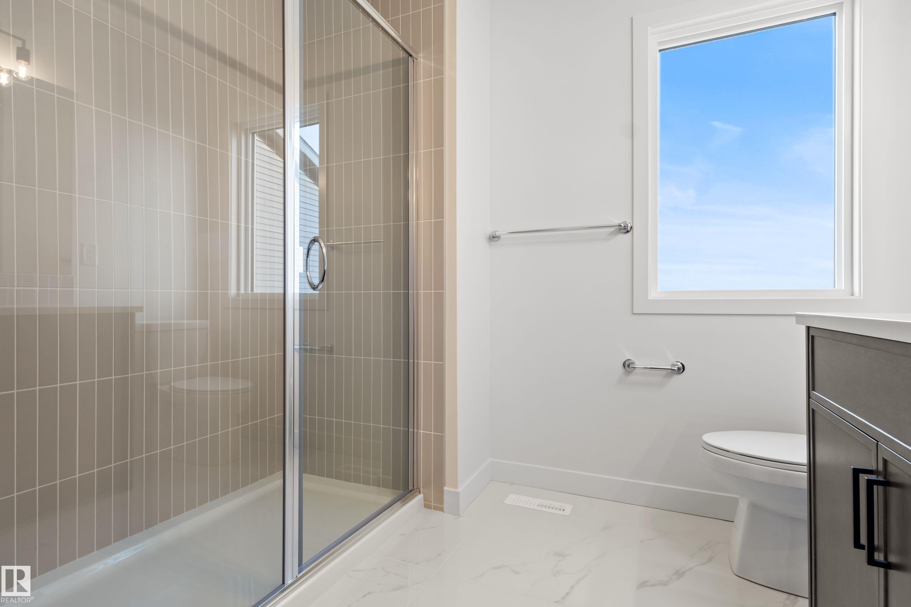 Photo 10 at 2124 Muckleplum Crescent SW, The Orchards At Ellerslie, Edmonton