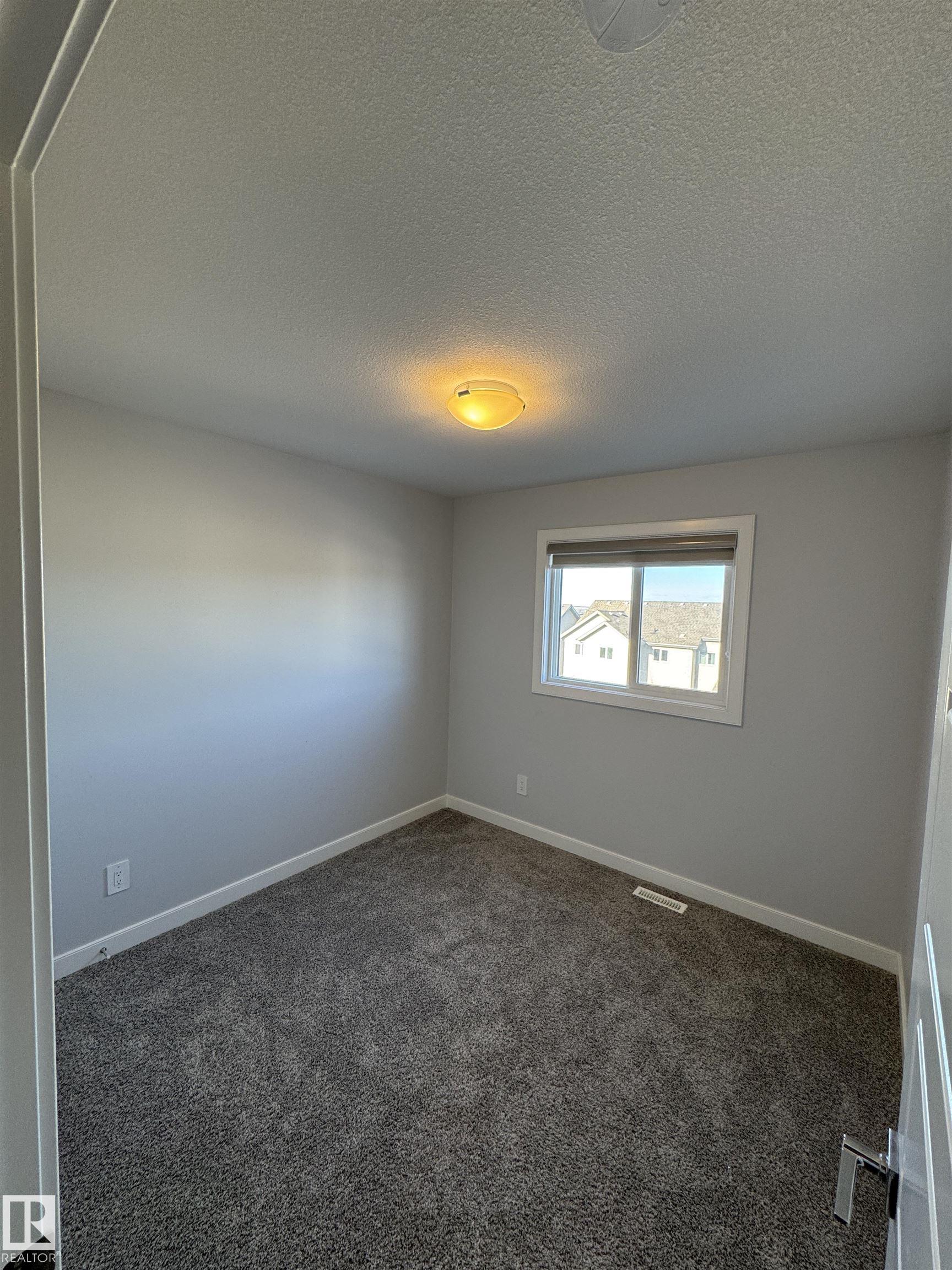 Photo 7 at 858 Northern Harrier Lane NW, Hawks Ridge, Edmonton