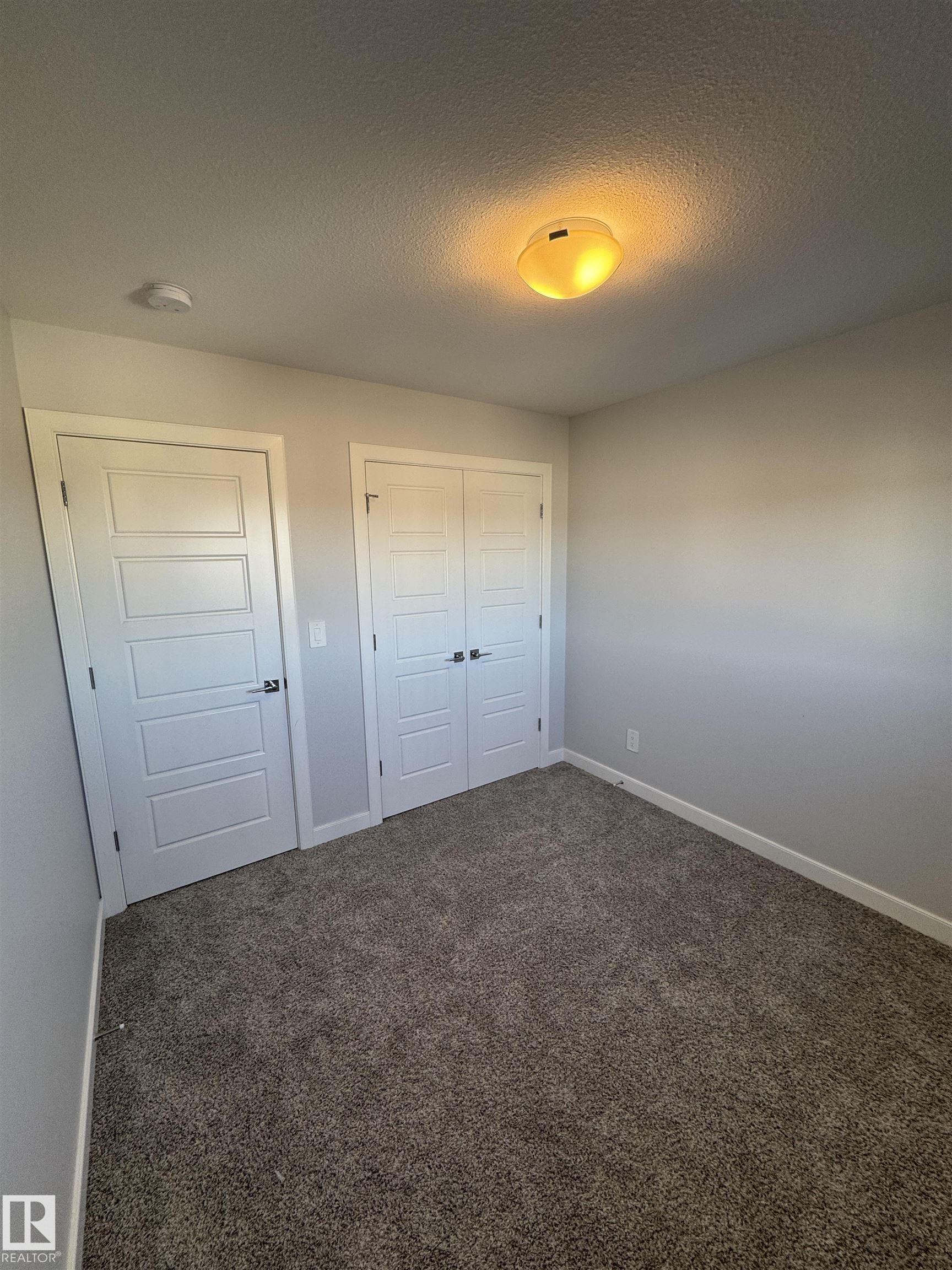 Photo 8 at 858 Northern Harrier Lane NW, Hawks Ridge, Edmonton