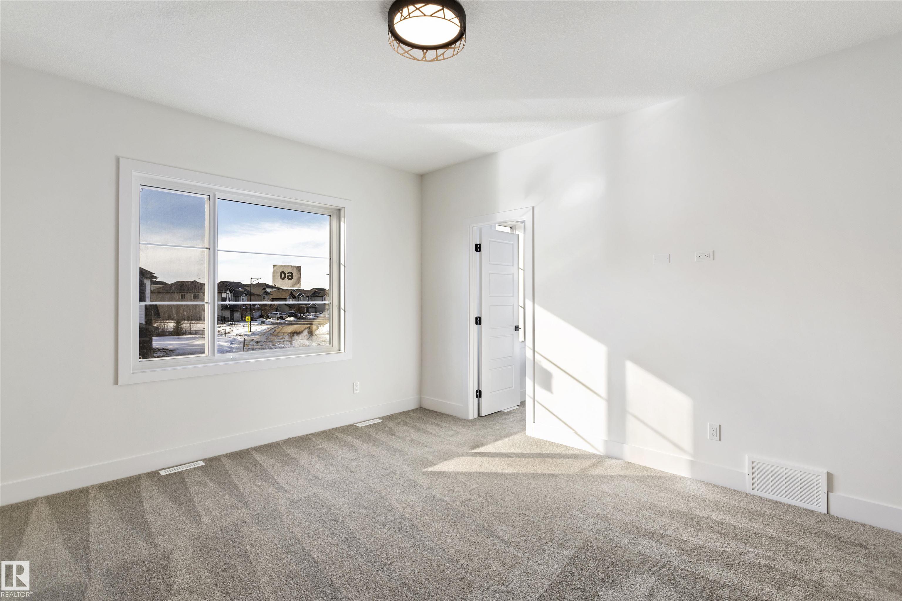 Photo 34 at 60 Meadowgrove Landing, McLaughlin, Spruce Grove