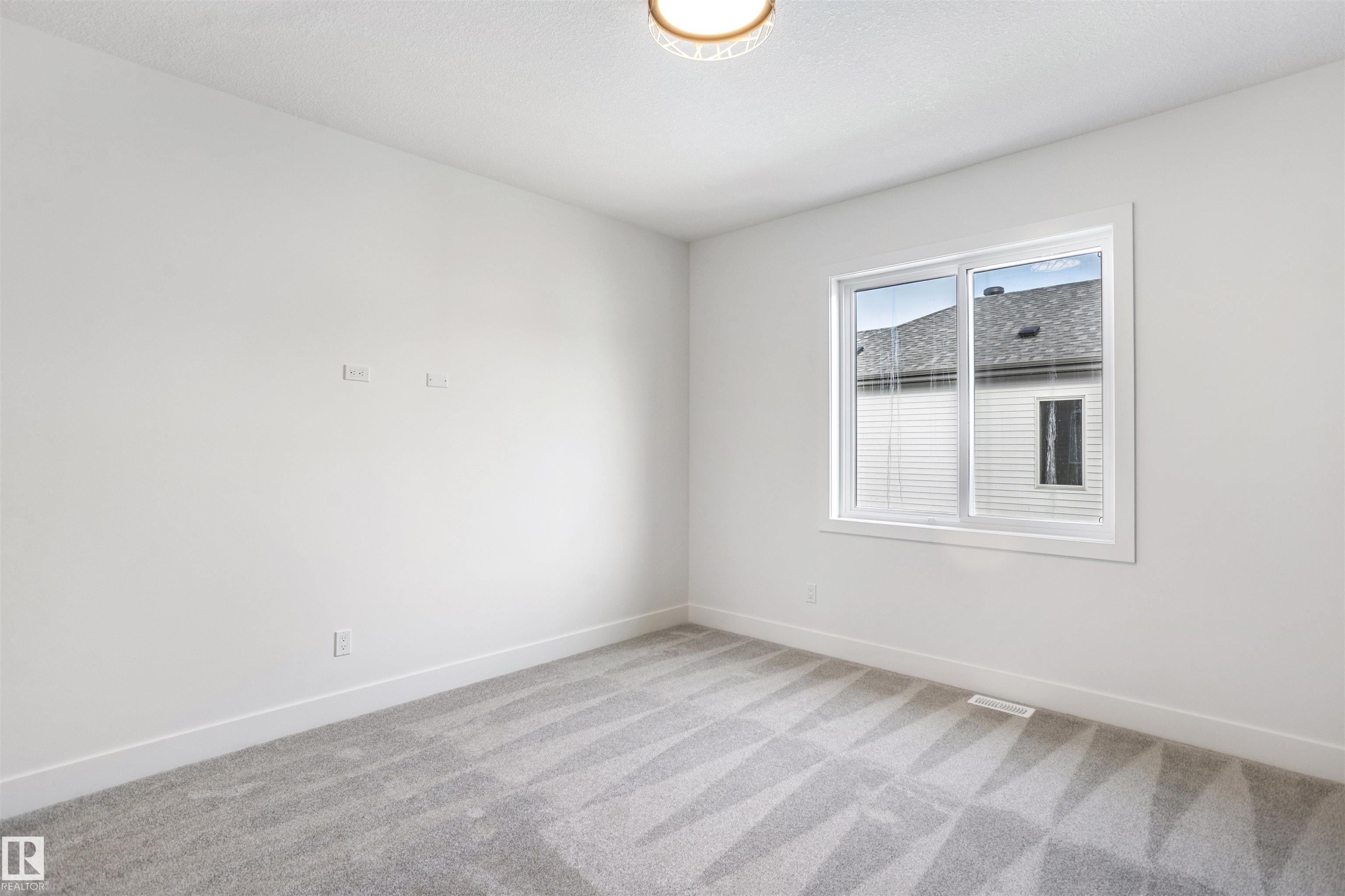 Photo 36 at 58 Meadowgrove Landing, McLaughlin, Spruce Grove