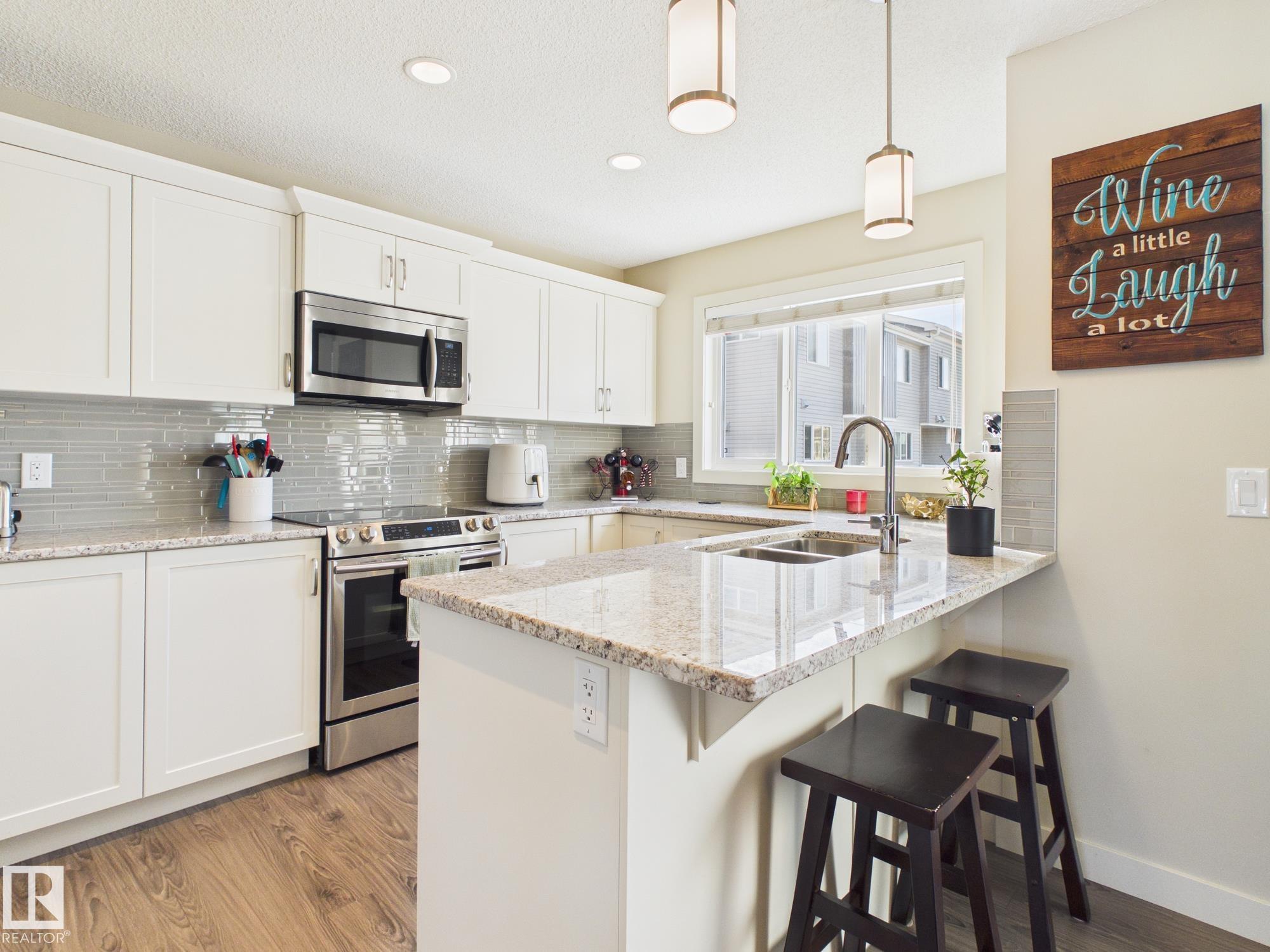 Photo 15 at 21 - 2121 Haddow Drive NW, Haddow, Edmonton