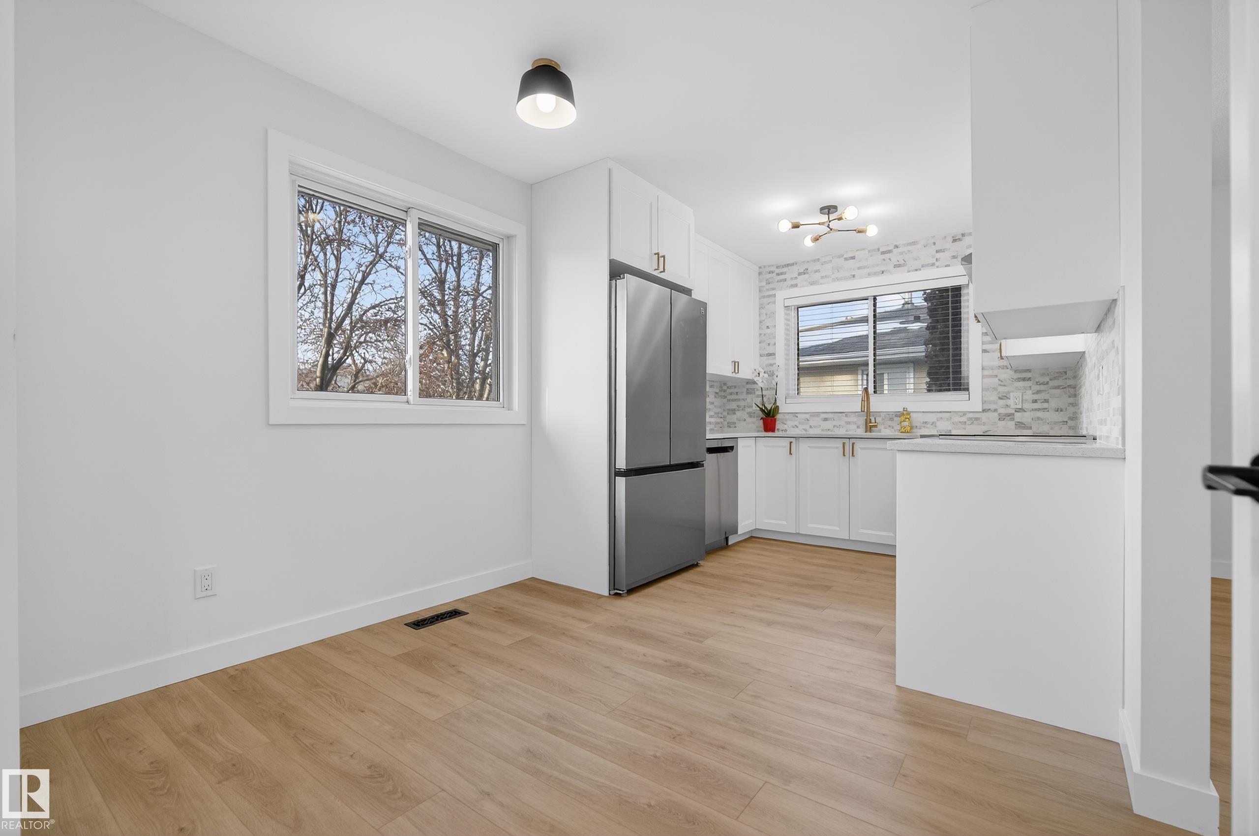 Photo 11 at 712 Knottwood Road S NW, Satoo, Edmonton