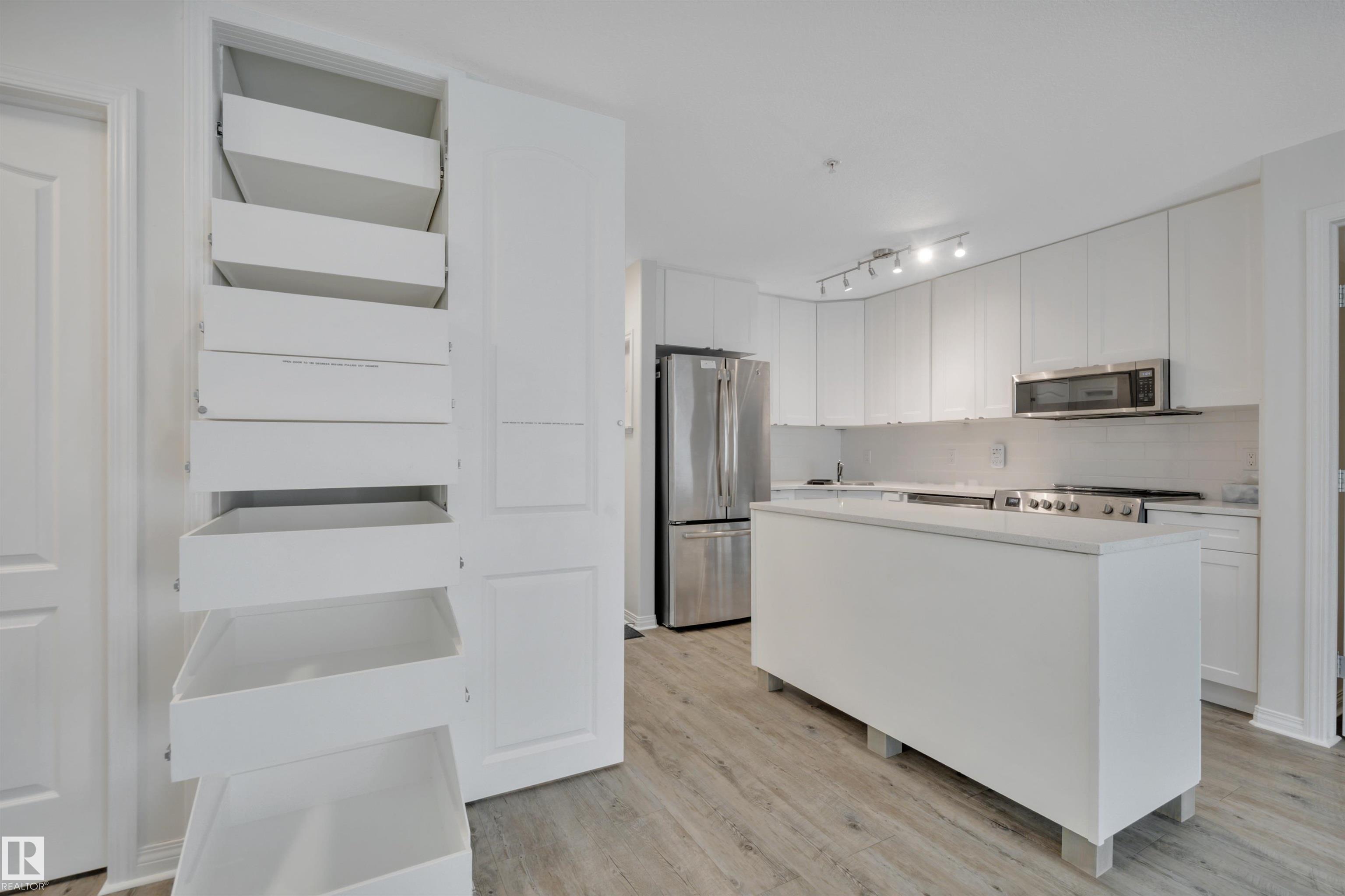 Photo 7 at 108 - 12550 140 Avenue NW, Baranow, Edmonton