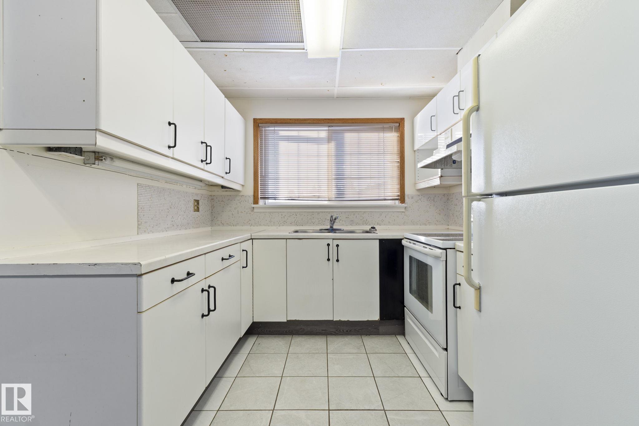 Photo 7 at 12023 137 Avenue NW, Kensington, Edmonton