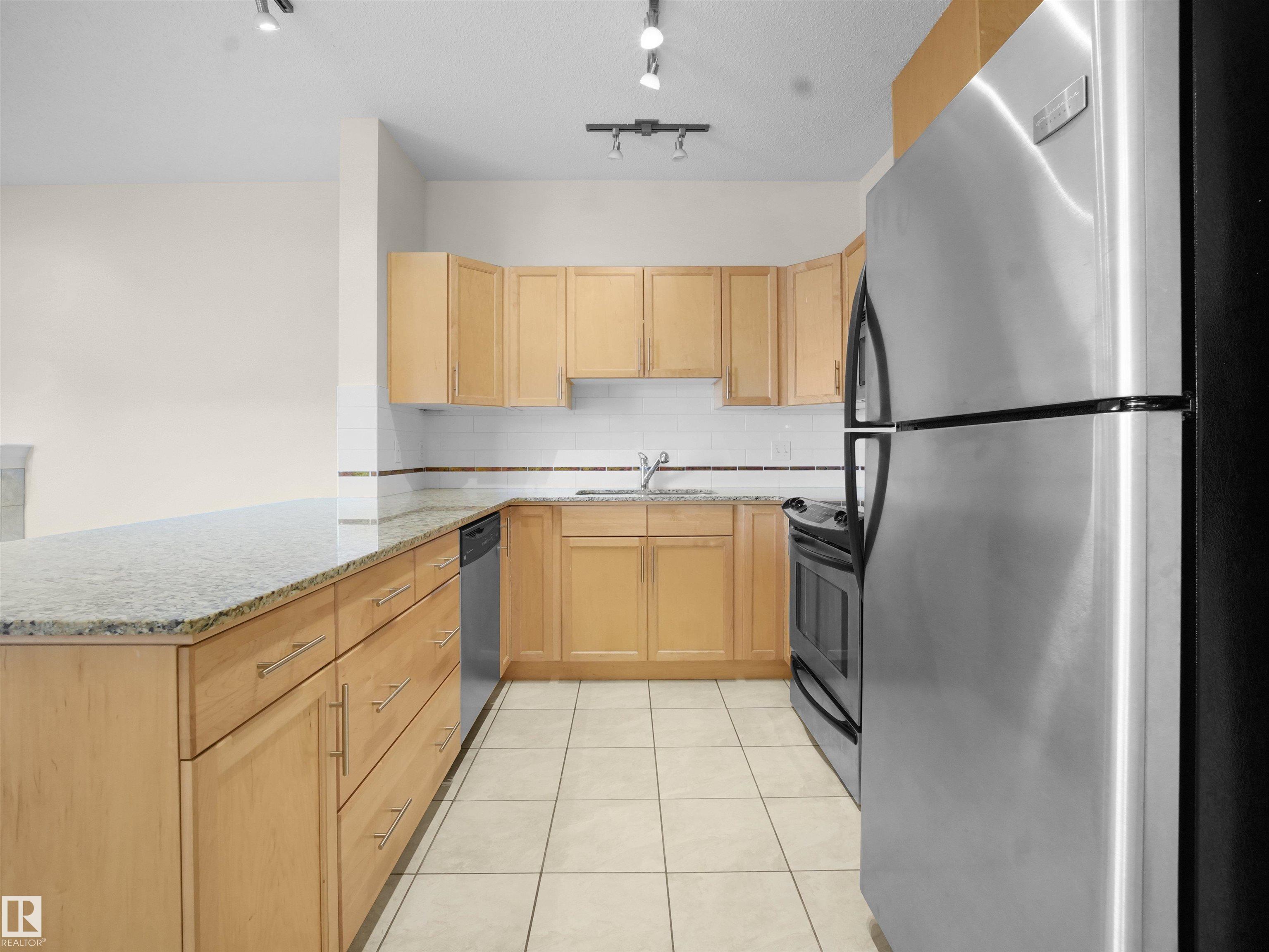 Photo 17 at 308 - 10333 112 Street NW, Wîhkwêntôwin, Edmonton