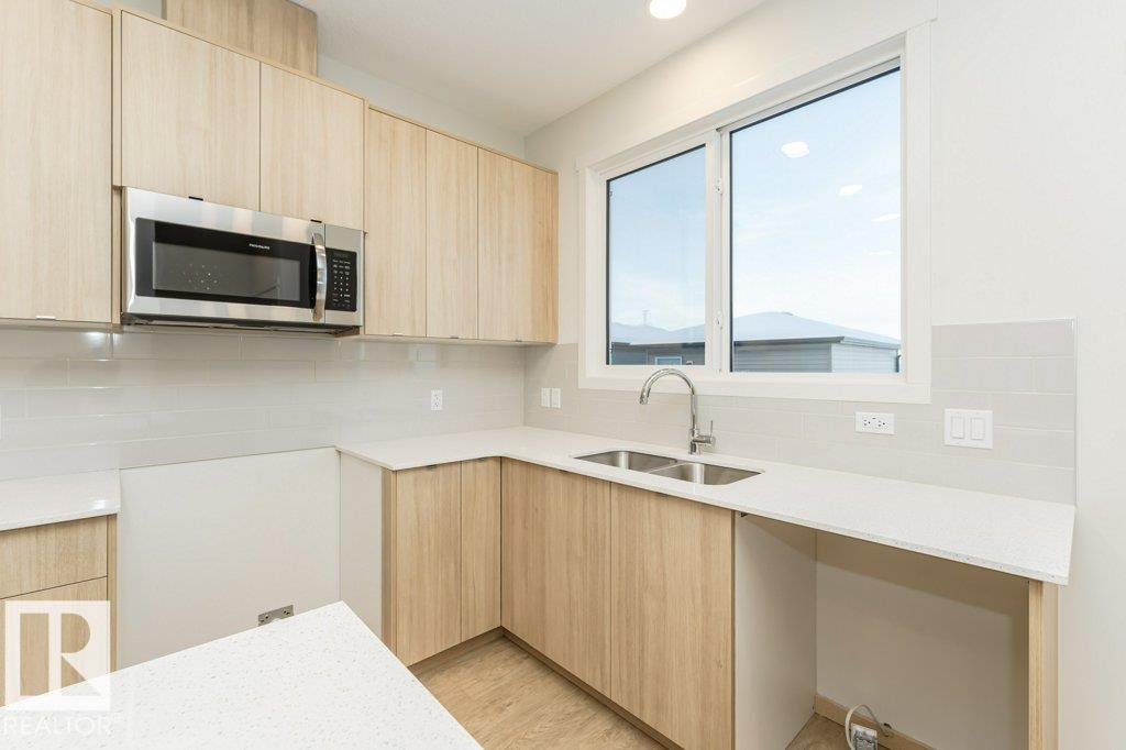 Photo 9 at 17548 63 Street NW, McConachie Area, Edmonton