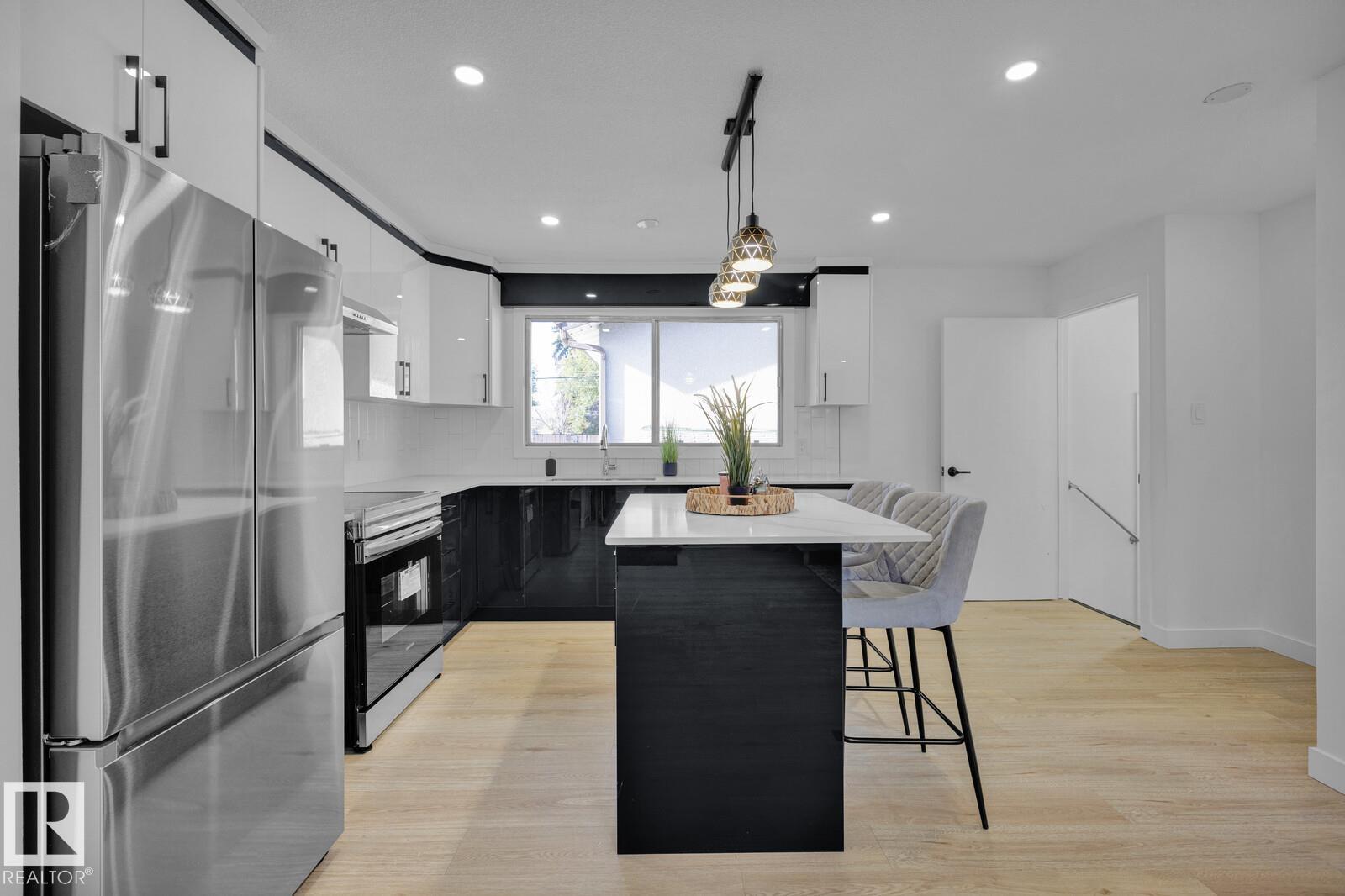 Photo 7 at 5803 136 Avenue NW, Belvedere, Edmonton