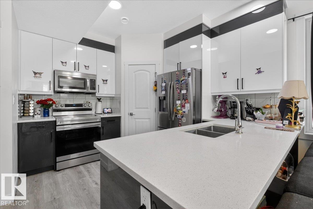 Photo 12 at 1 - 11616 82 Street NW, Parkdale, Edmonton