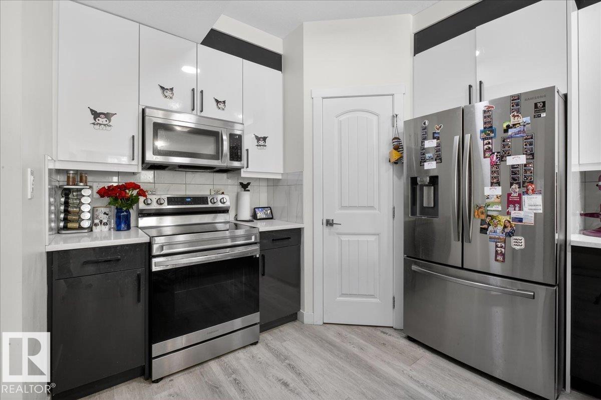 Photo 13 at 1 - 11616 82 Street NW, Parkdale, Edmonton