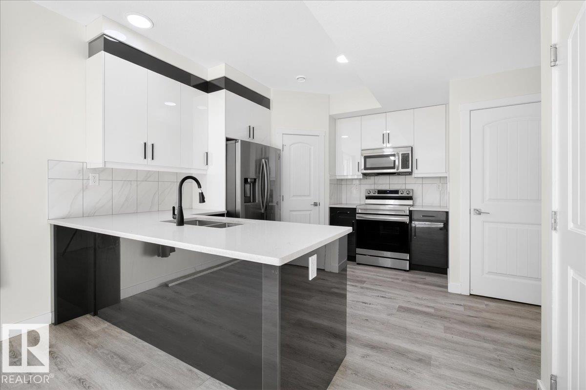 Photo 13 at 2 - 11616 82 Street NW, Parkdale, Edmonton