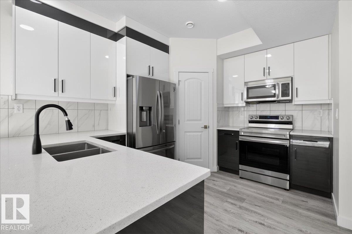 Photo 15 at 2 - 11616 82 Street NW, Parkdale, Edmonton