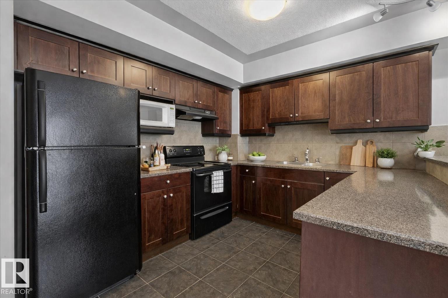 Photo 32 at 208 - 4415 48 Street, Alexandra Park, Leduc