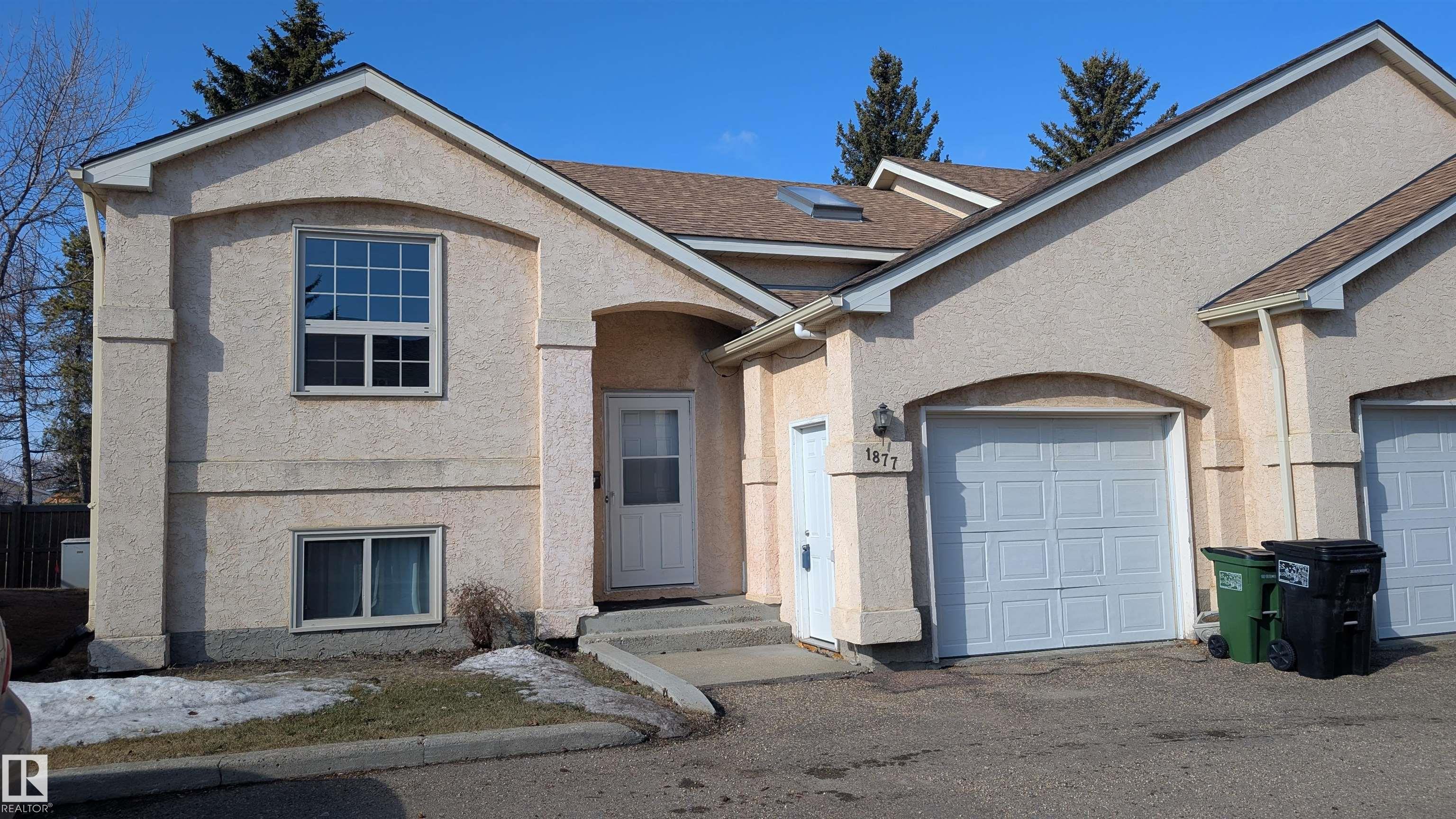 Just Move in! Beautifully Renovated and Modern Bilevel. Open and Unique floor plan. Over 1,481 sf of living space with 2 bedrooms, 2 baths plus an Attached Garage. Low maintenance. Renovation includes flooring, bath fixtures, lighting, appliances, hot water tank, and more. Huge Living Room with Fireplace and large Dining Room open to Deck. Loft style Family Room / Flex Room with Skylight, great for home office, library, play area or media room. Practical Kitchen with loads of storage and windows.  Stainless steel appliances. Condo is well managed. Amenities include tennis / basketball court. Quiet location but easy access to anywhere. Perfect investment for professionals and families. Don't miss out this great buy!