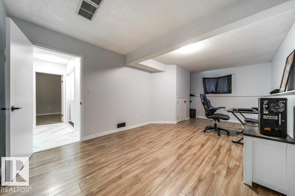 Photo 16 at 1877 Mill Woods Road E NW, Daly Grove, Edmonton