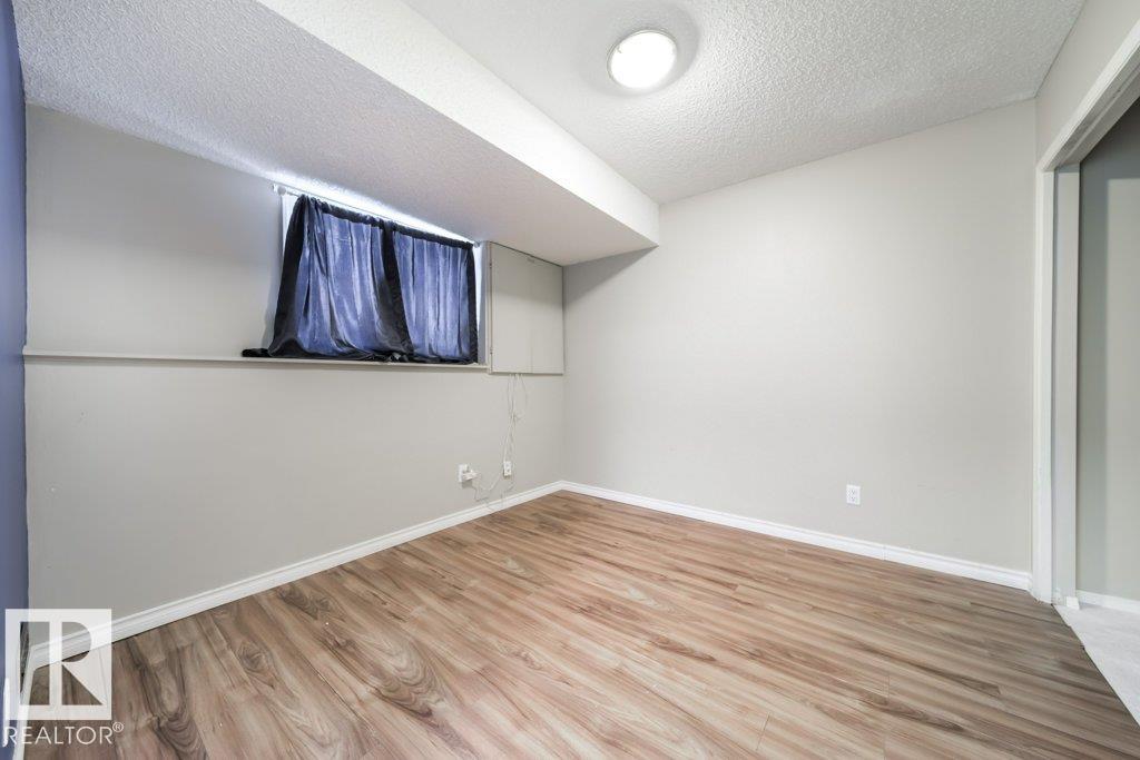 Photo 18 at 1877 Mill Woods Road E NW, Daly Grove, Edmonton