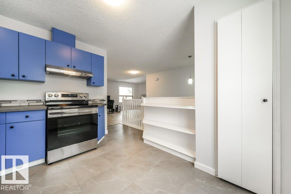 Photo 8 at 1877 Mill Woods Road E NW, Daly Grove, Edmonton