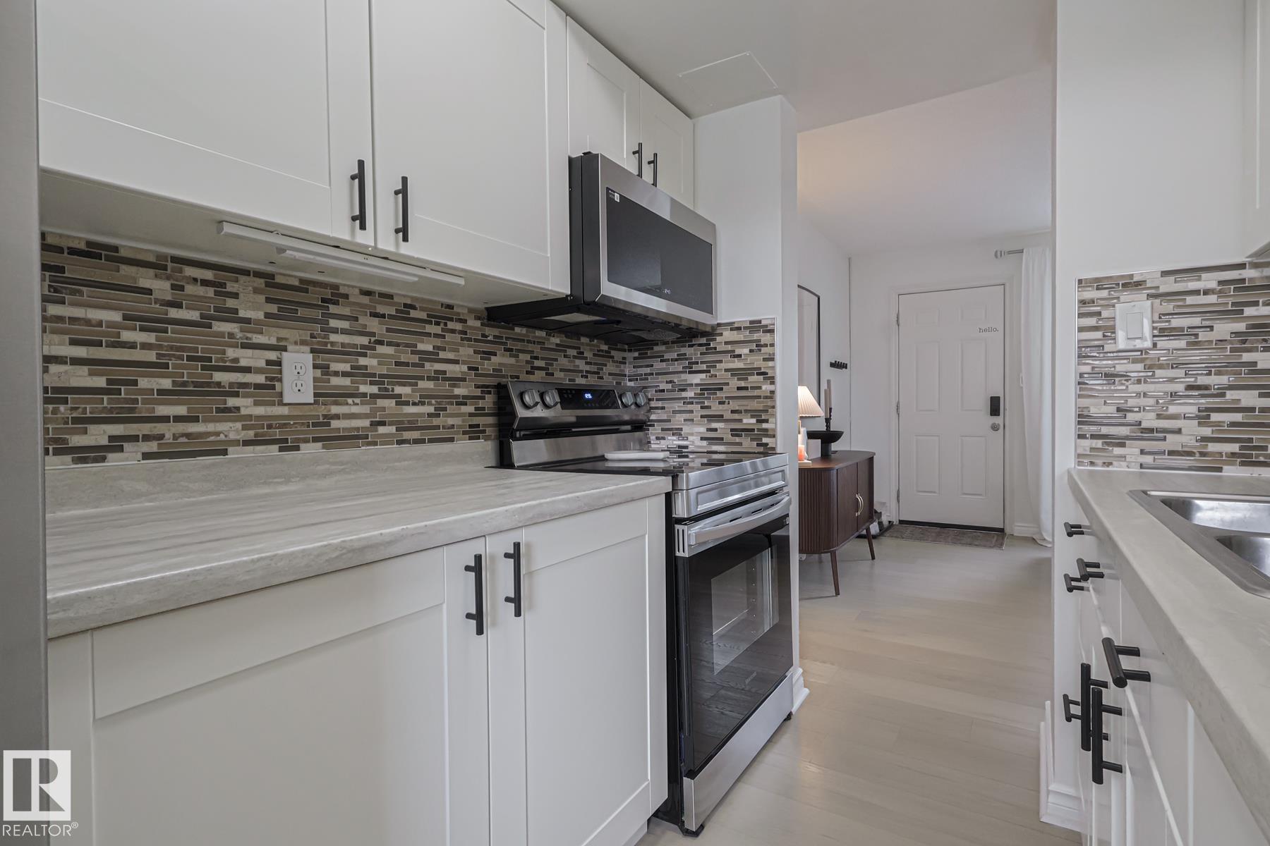 Photo 9 at 663 Abbottsfield Road NW, Abbottsfield, Edmonton