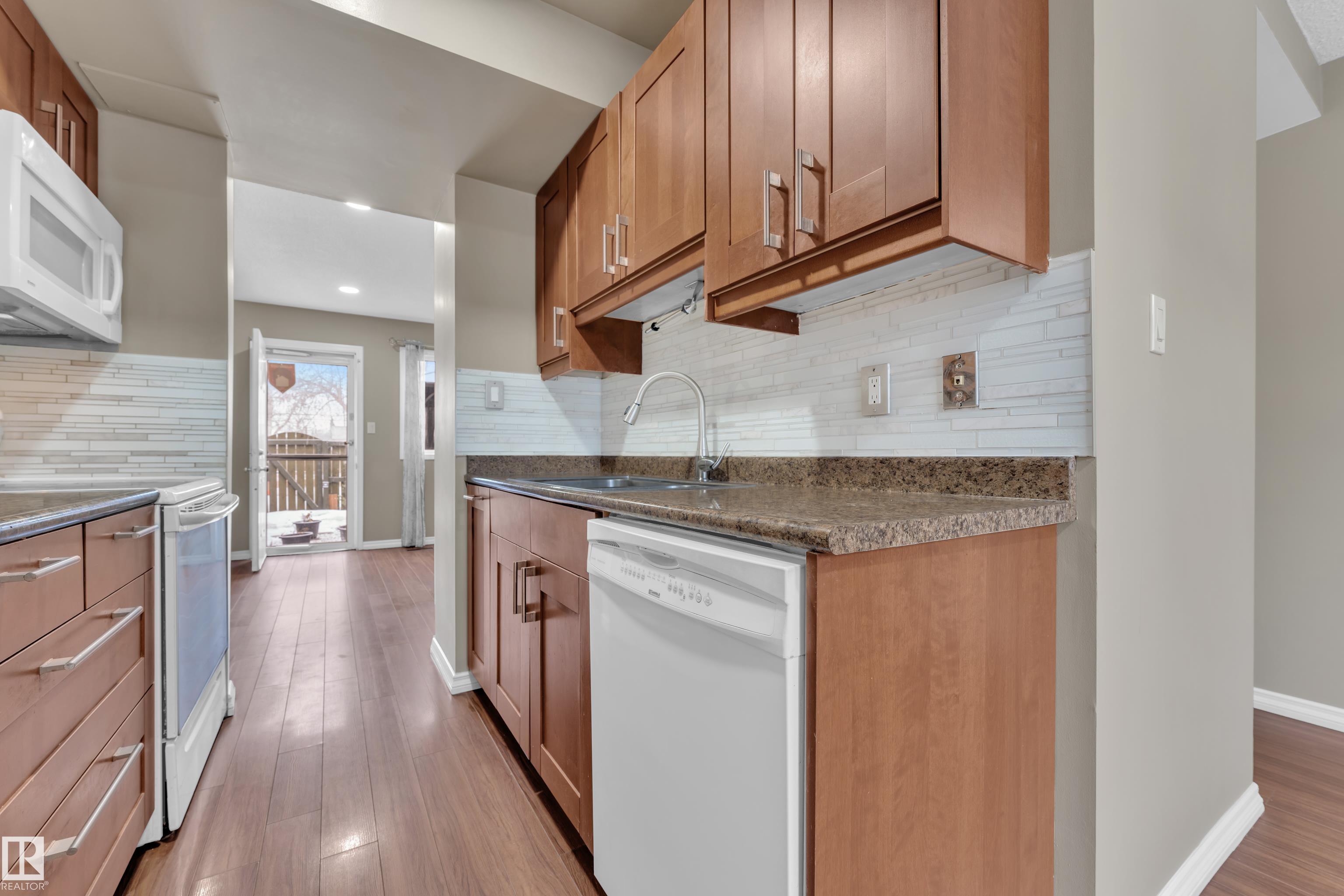 Photo 13 at 896 Abbottsfield Road NW, Abbottsfield, Edmonton