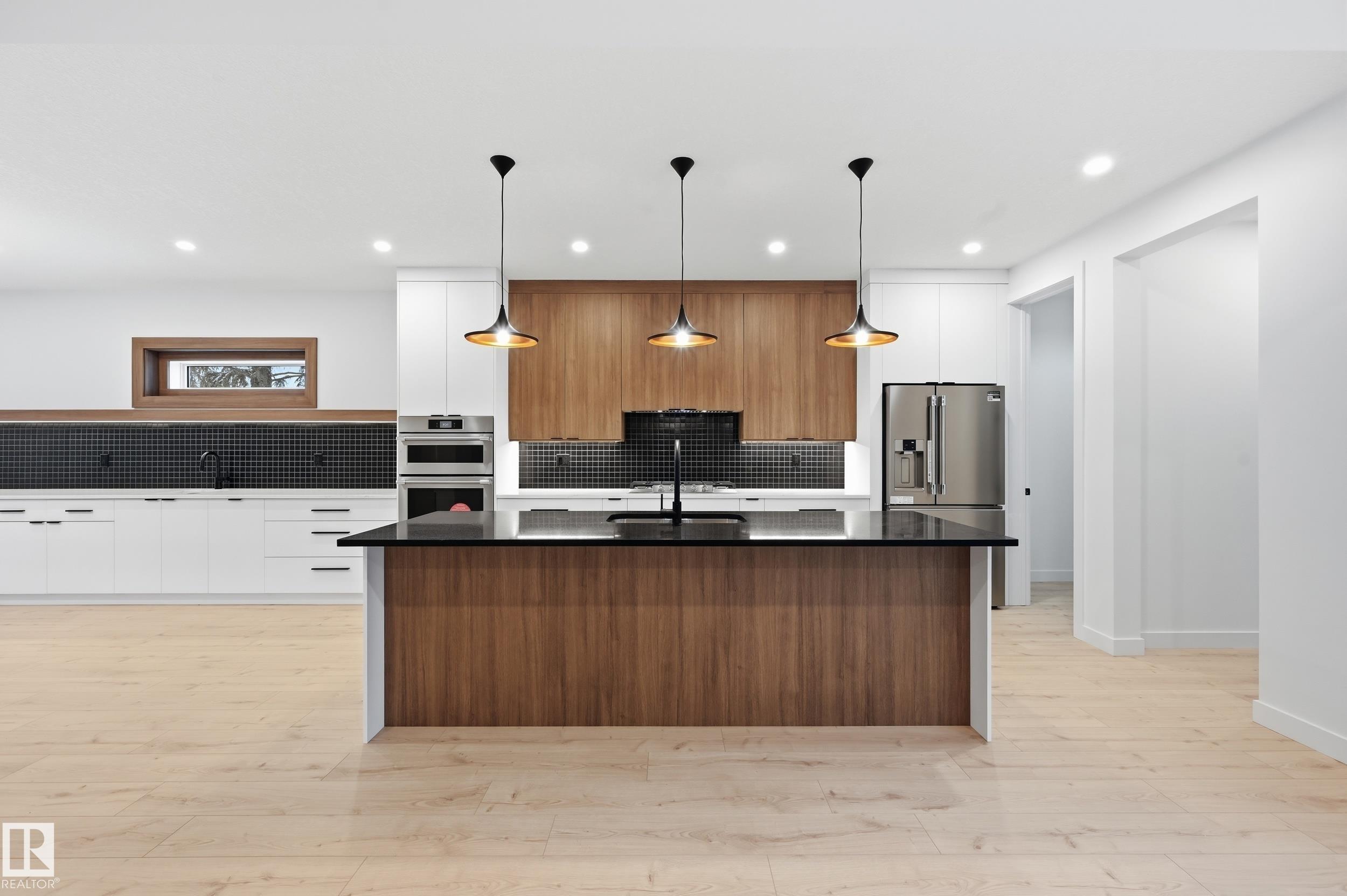 Photo 13 at 11121 51 Street NW, Highlands, Edmonton