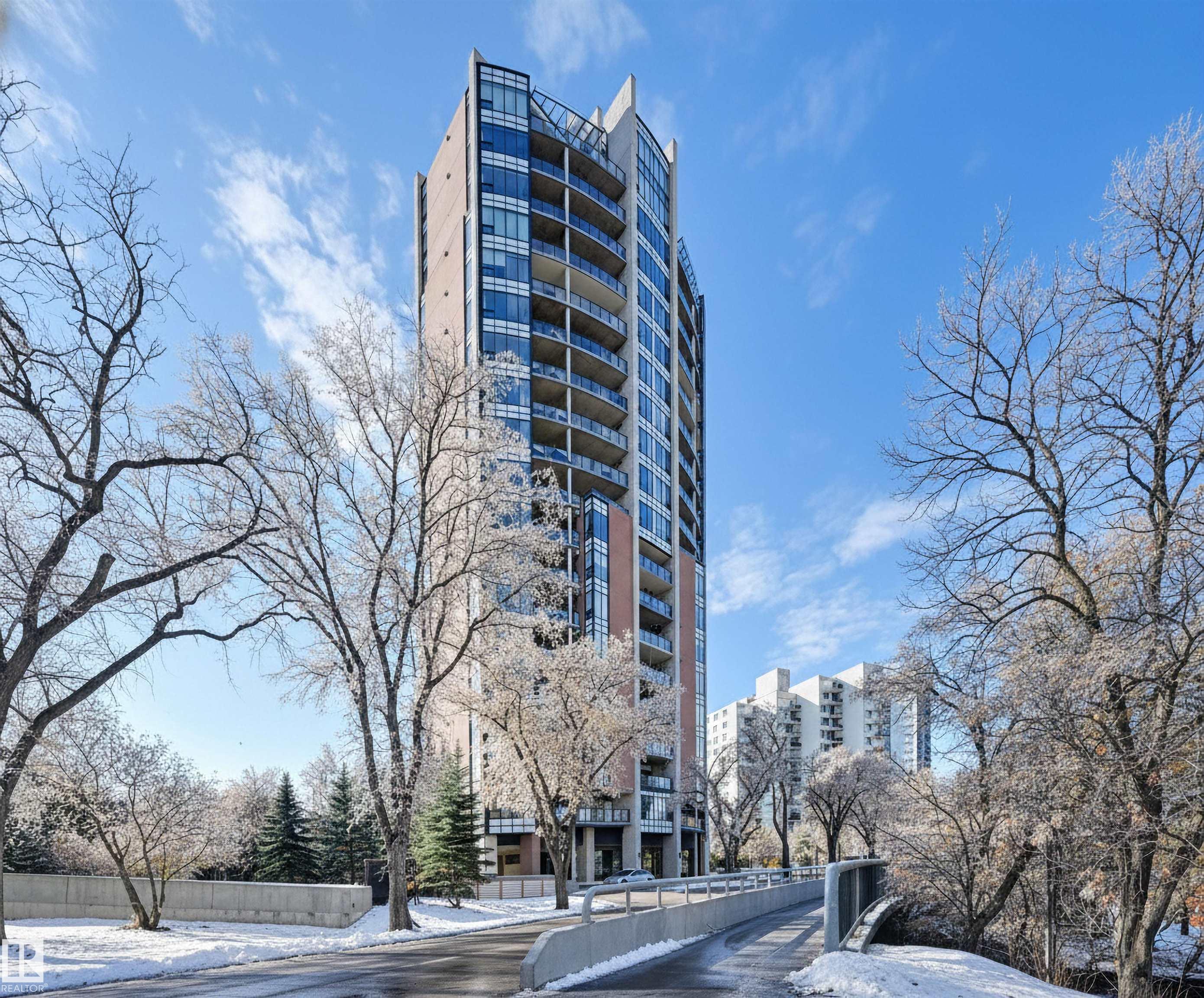 Situated in the prestigious One River Park, this 2,772 sq. ft. residence offers an elegant lifestyle immersed in spectacular River Valley and downtown views. The experience begins as your private elevator opens into a sprawling living space suitable for grand-scale entertaining. The sleek Snaidero kitchen features granite counters and Miele appliances. Host in the spacious dining room, complete with a custom bar and dual Sub-Zero wine fridges, or retreat to one of two balconies to take in the jaw-dropping skyline. Each of the three bedrooms is a private sanctuary with a recently renovated ensuite; the primary suite features his-and-her closets with high-end built-ins. A luxurious office and media room add to the sophisticated layout. This immaculate suite is rounded out by a whole-home sound system and a rare, private 4-car garage plus a 5th stall and storage room. Enjoy an on site concierge, guest suite, and fitness studio. A true one-of-a-kind showpiece overlooking the city’s finest views.