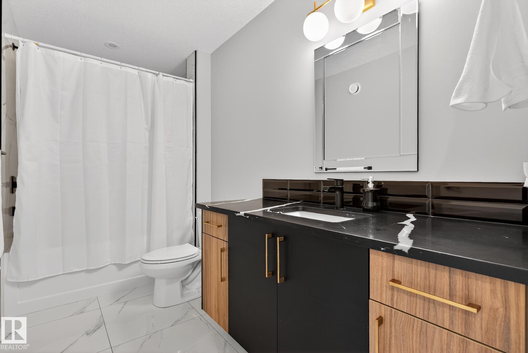 Photo 22 at 1027 150 Avenue NW, Fraser, Edmonton