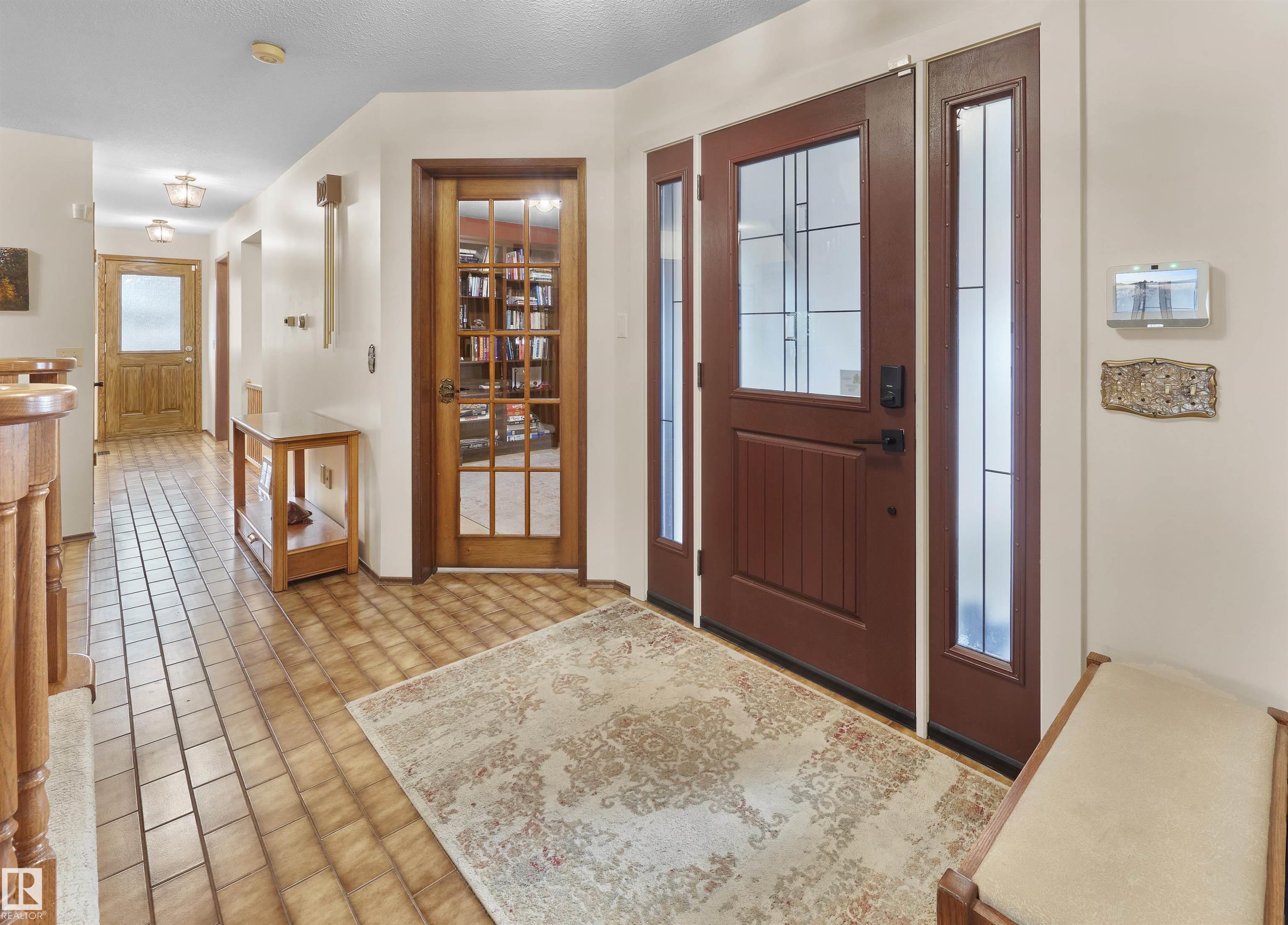 Photo 3 at 10908 Bearspaw Drive W NW, Bearspaw, Edmonton