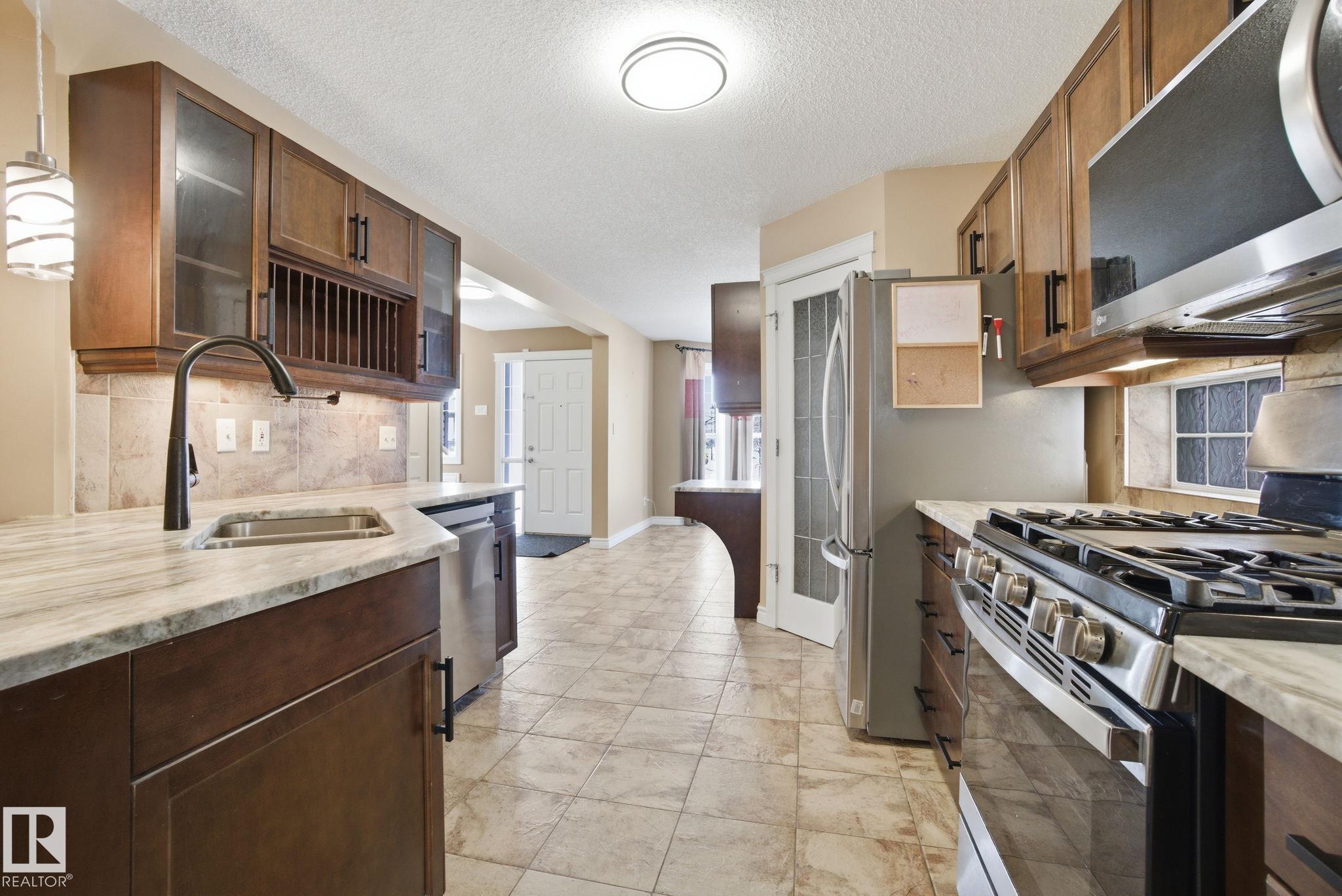 Photo 14 at 61 Suntree Promenade, Suntree, Leduc