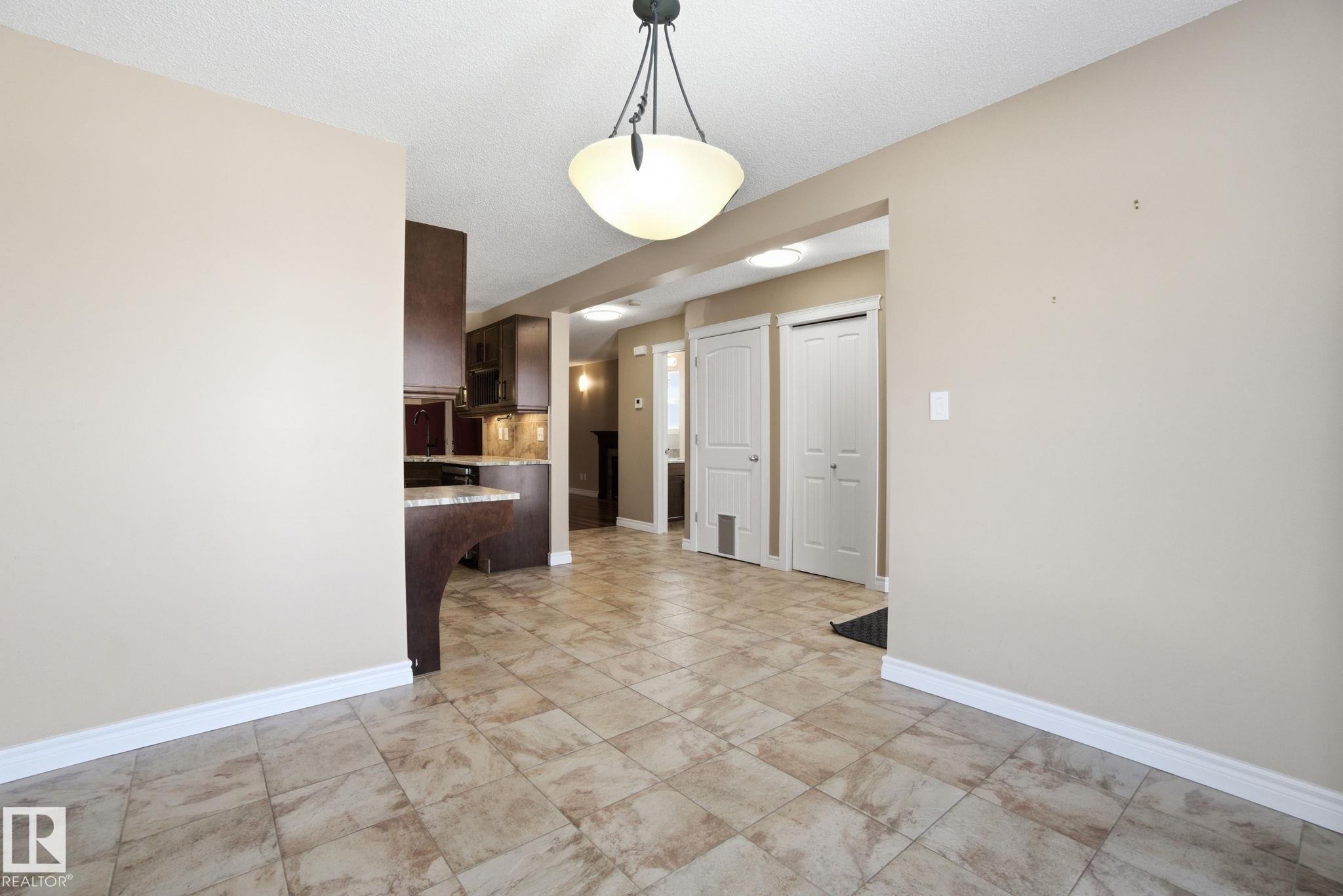 Photo 10 at 61 Suntree Promenade, Suntree, Leduc