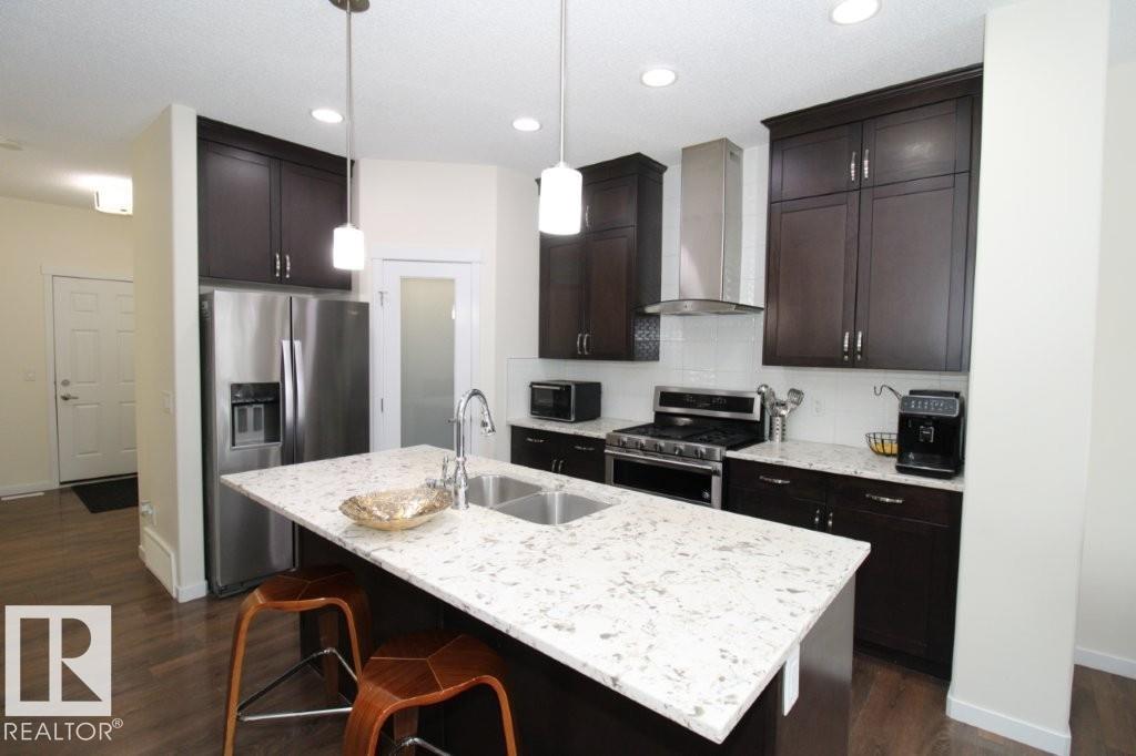 Photo 9 at 3043 Checknita Way SW, Cavanagh, Edmonton