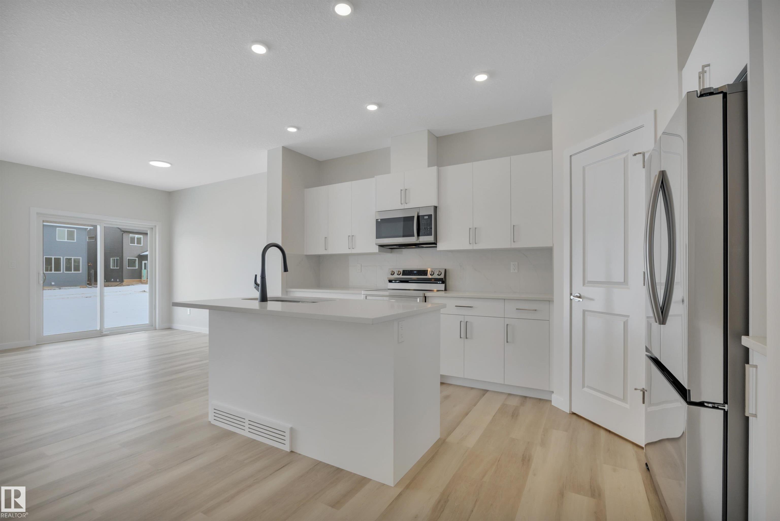 Photo 7 at 5625 Hawthorn Way SW, The Orchards At Ellerslie, Edmonton