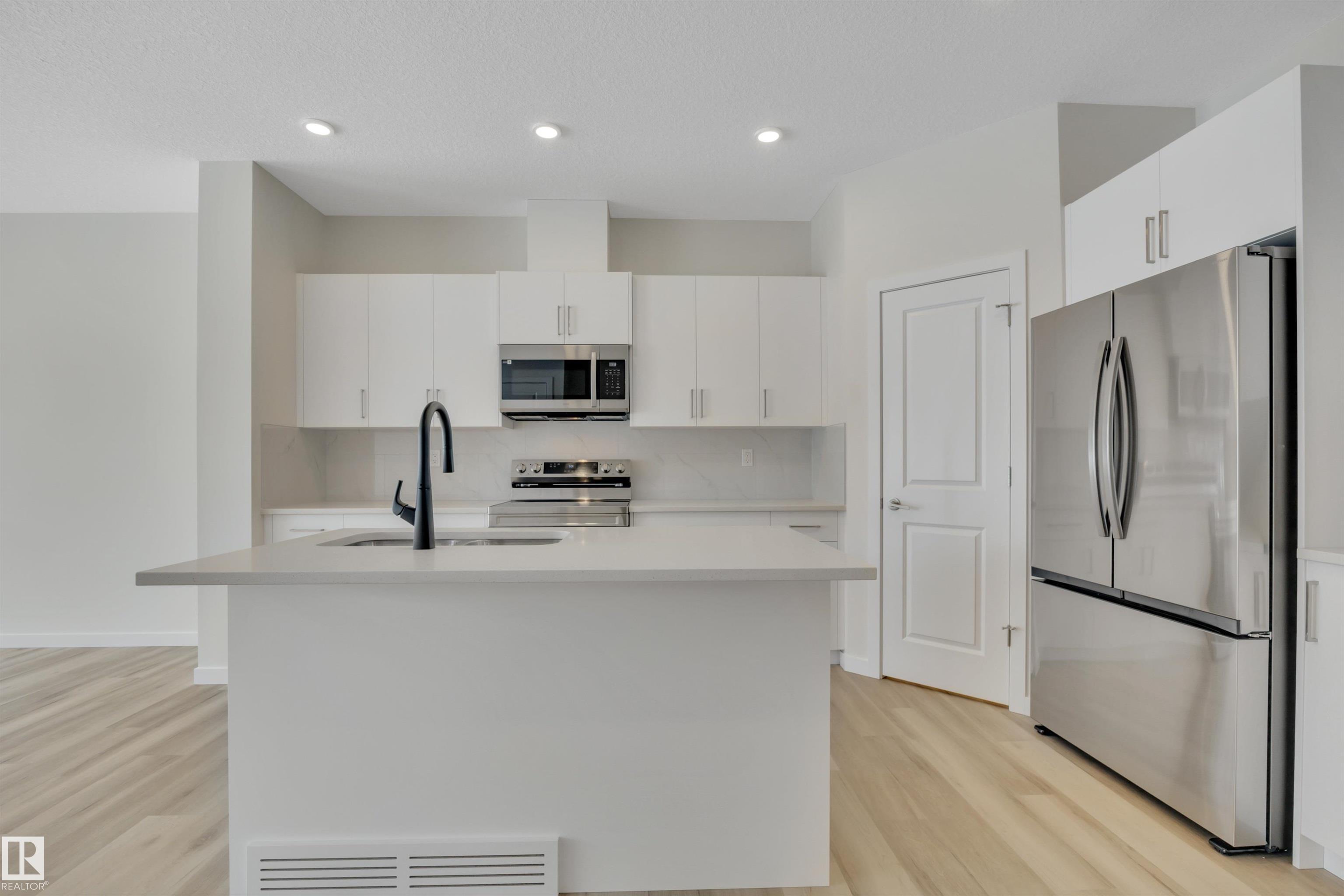 Photo 8 at 5625 Hawthorn Way SW, The Orchards At Ellerslie, Edmonton