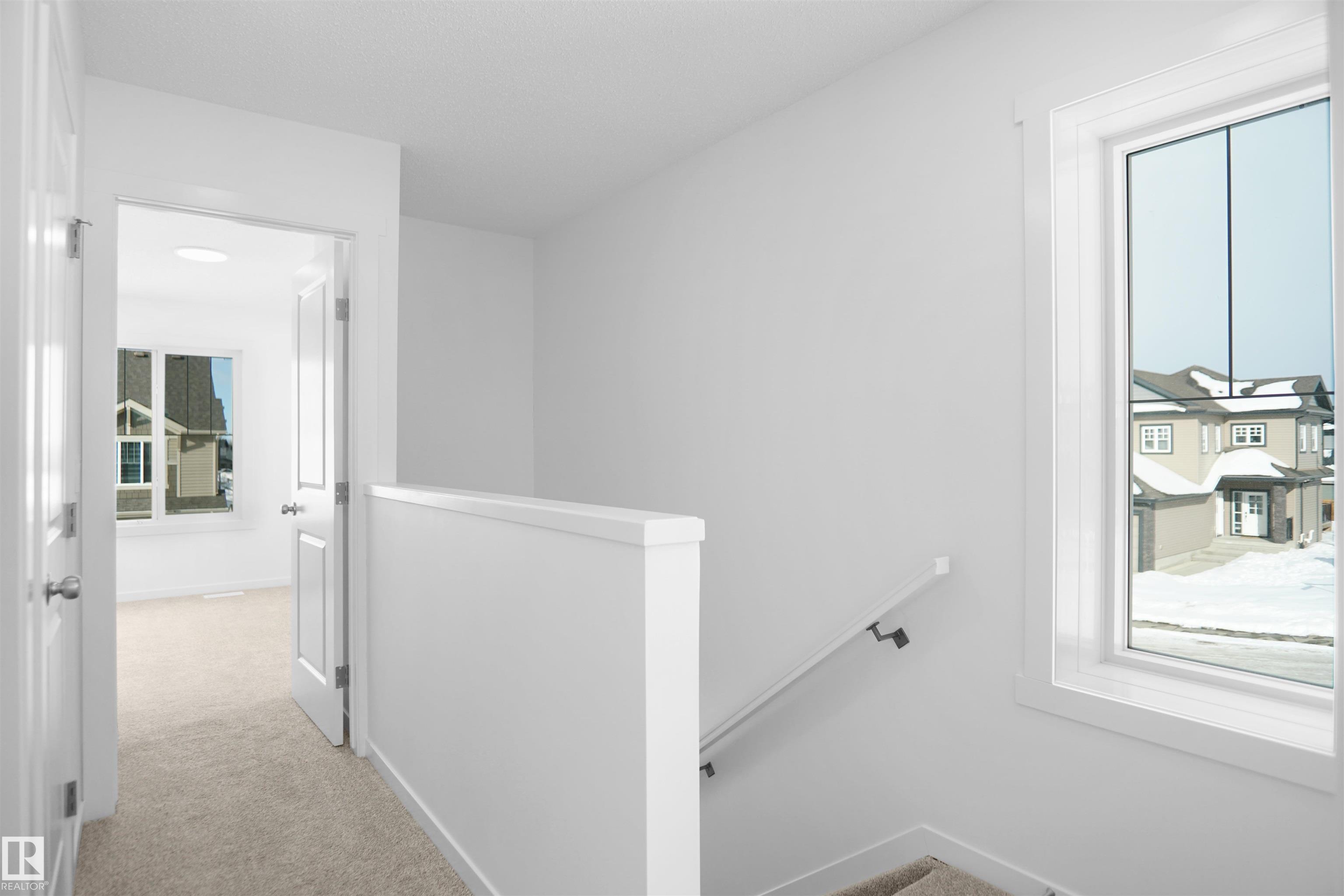 Photo 12 at 40 - 531 Merlin Landing NW, Hawks Ridge, Edmonton