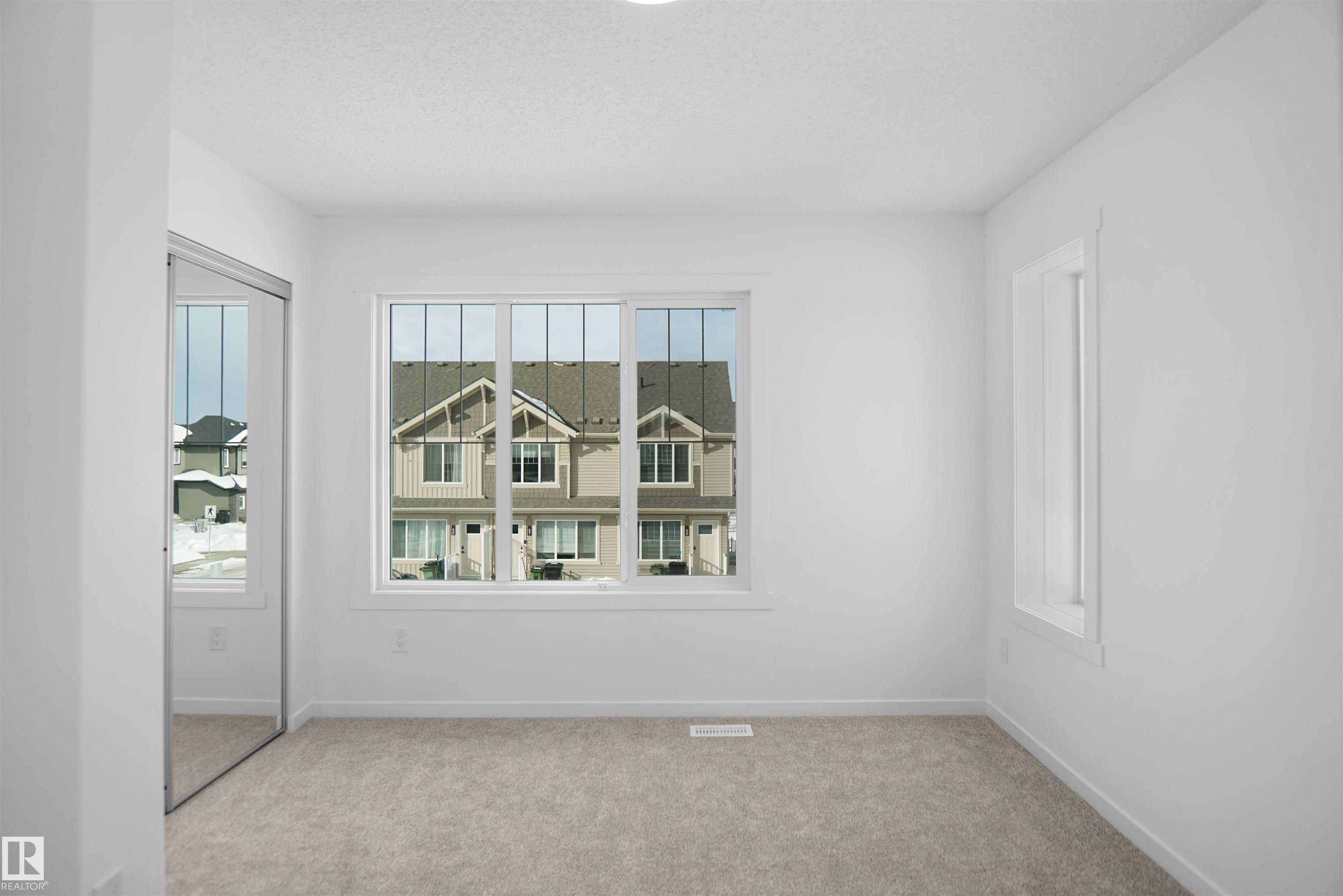 Photo 13 at 40 - 531 Merlin Landing NW, Hawks Ridge, Edmonton