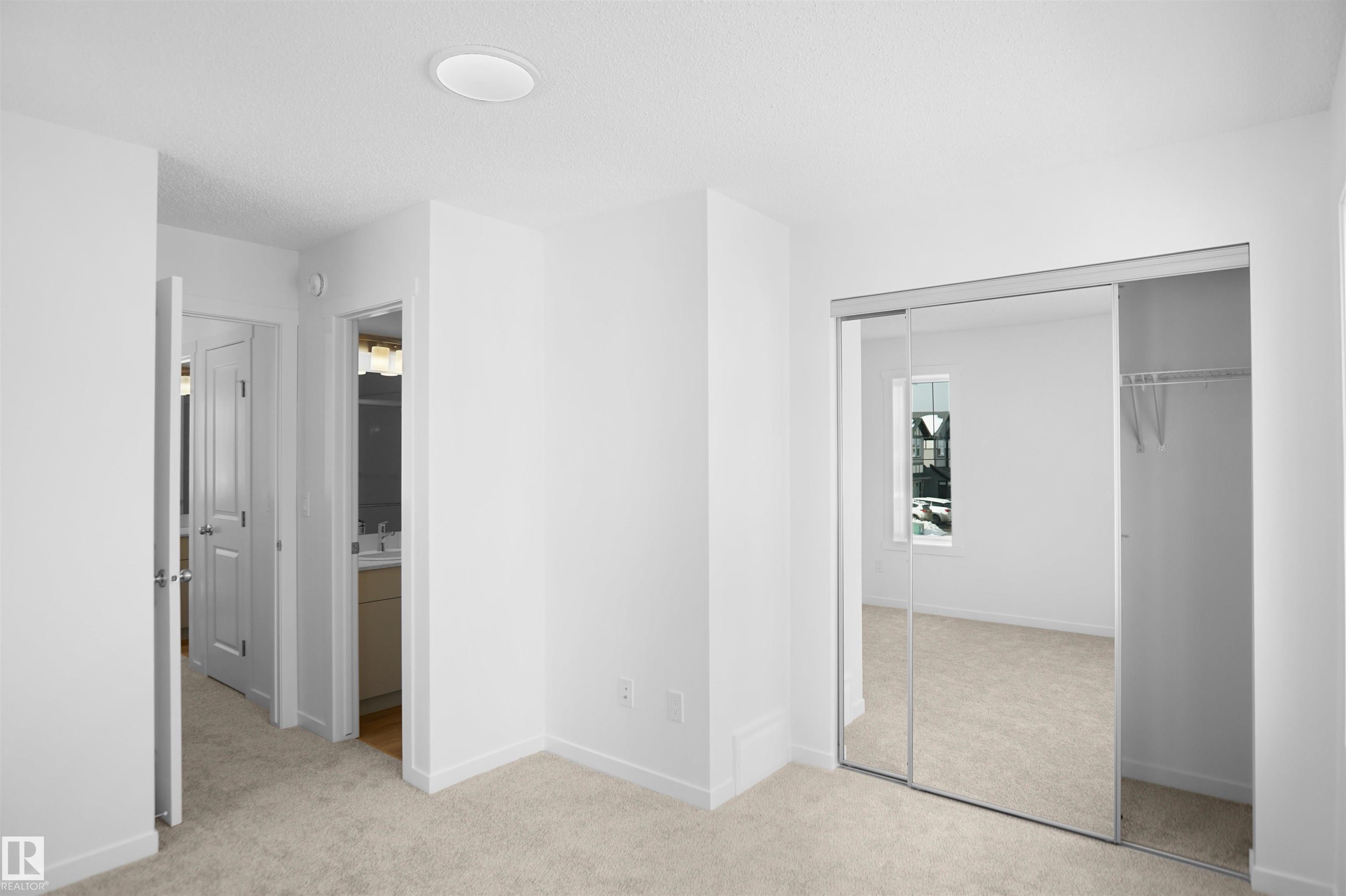 Photo 14 at 40 - 531 Merlin Landing NW, Hawks Ridge, Edmonton