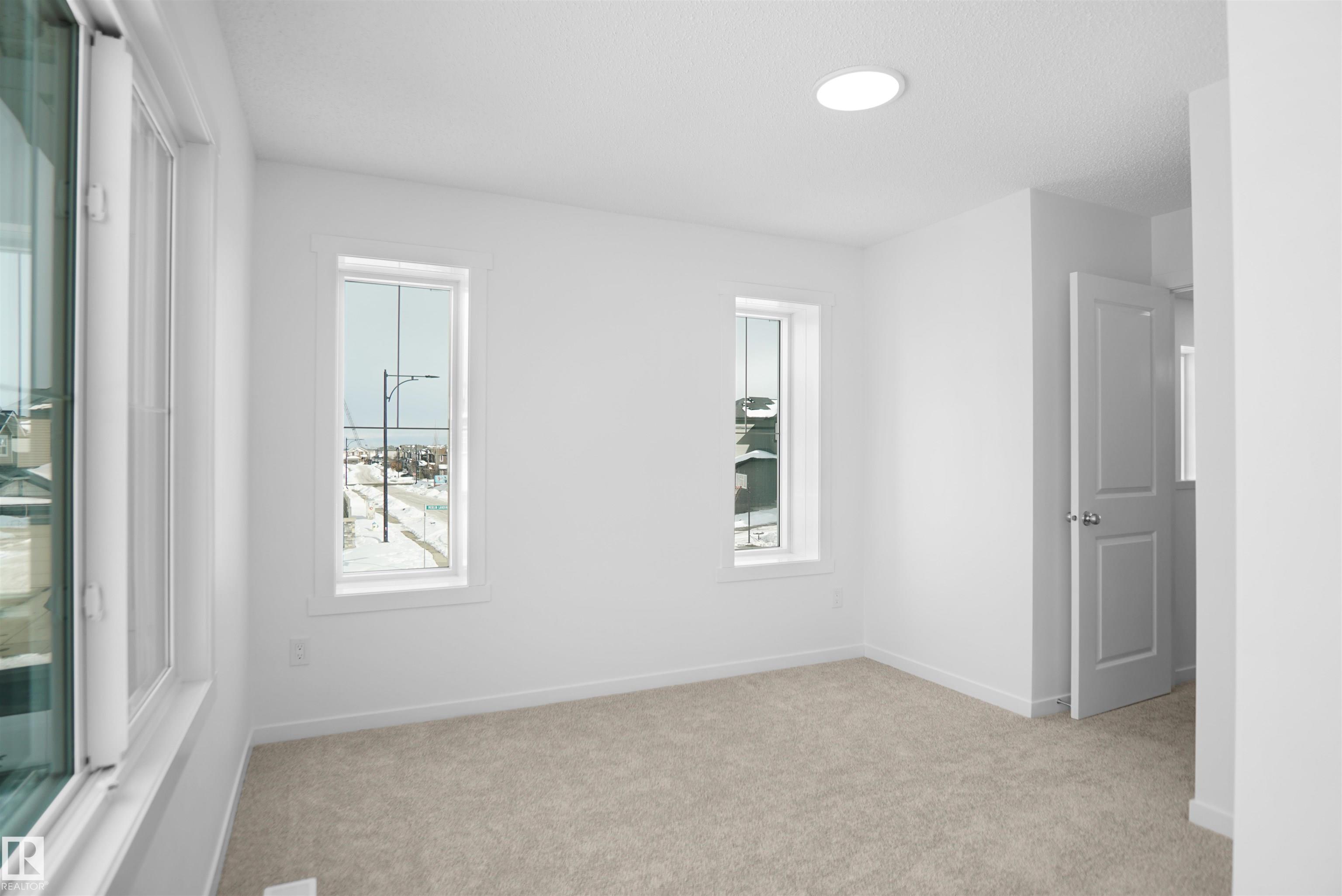 Photo 15 at 40 - 531 Merlin Landing NW, Hawks Ridge, Edmonton