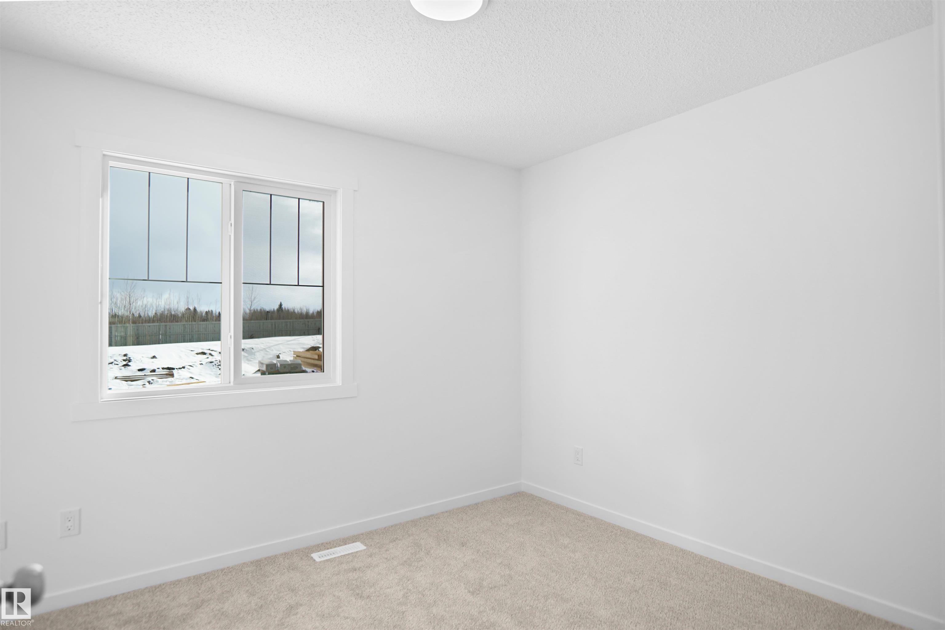 Photo 18 at 40 - 531 Merlin Landing NW, Hawks Ridge, Edmonton