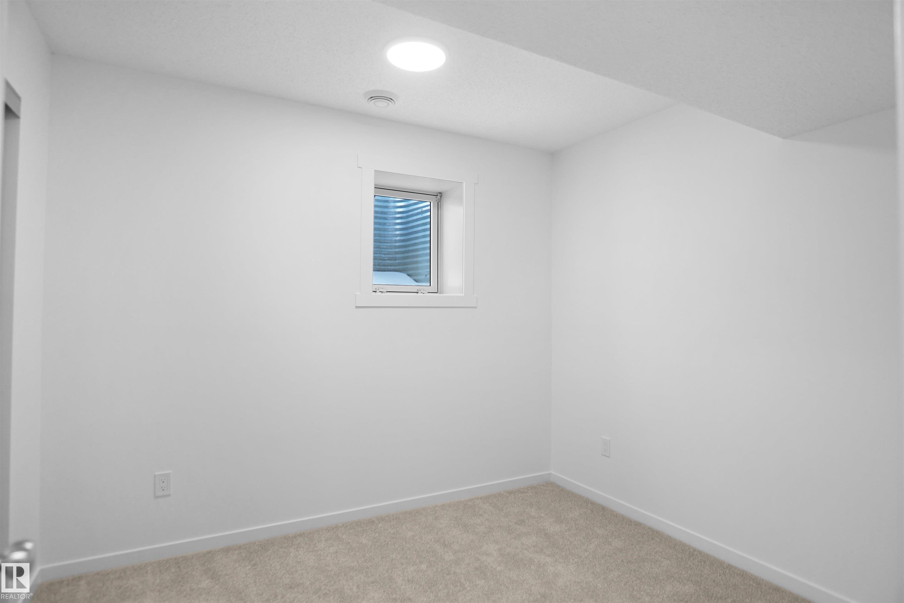 Photo 26 at 40 - 531 Merlin Landing NW, Hawks Ridge, Edmonton