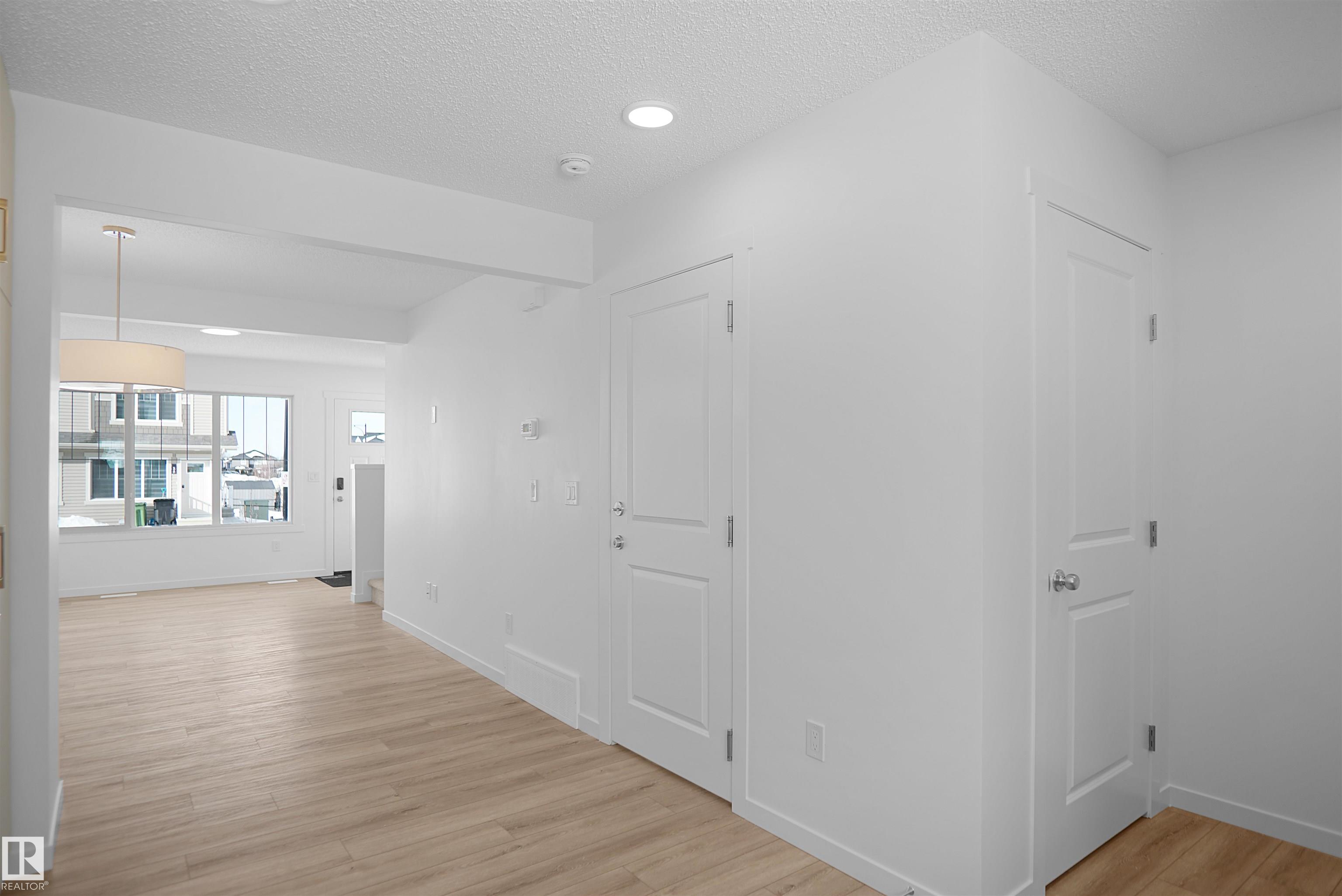 Photo 7 at 40 - 531 Merlin Landing NW, Hawks Ridge, Edmonton