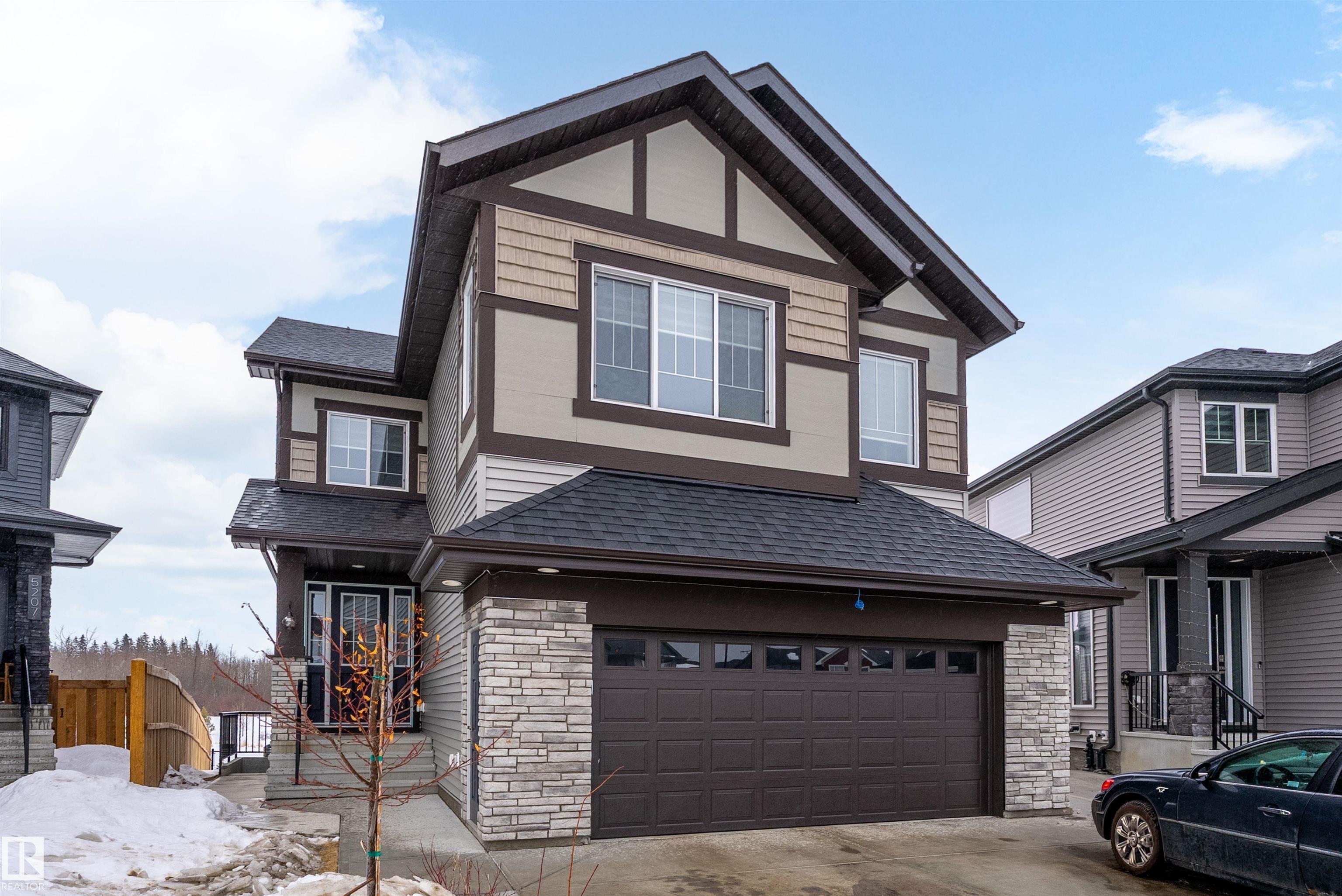 Amazing LOCATION in a CUL DE SAC on a PIE LOT & backing the NATURAL TREES, LAKE, TRAILS & just steps from the SCHOOL! This LANDMARK 2 STOREY features an 'OPEN TO BELOW' great room with TRAY CEILINGS, FIREPLACE, iron & wood railings, LVP FLOORING, GRANITE COUNTERS, 9' CEILINGS on 3 levels & large windows to take in the SOUTH VIEWS! The contemporary ISLAND KITCHEN features a iSPRING WATER SYSTEM, stainless appliances & overlooks the spacious dining area & PATIO DOORS will provide access to the yard & future deck. Just off the kitchen is a large WALK THRU PANTRY complete with roughed in gas & direct vent for range hood ready for appliances & cabinets! A two pc. bath & access to the 20'x21 garage with 8' OH door. Up the stairs to a BONUS ROOM overlooking the yard & VIEW, 2 bedrooms with a 4 pc. bath, laundry plus a SPACIOUS PRIMARY with walk in closet & lovely ensuite including OVER SIZED SHOWER & TUB! Side entrance to the open basement! Custom blinds, RI security, HI VELOCITY HEAT, TANKLESS HWT. IT'S LOVELY!