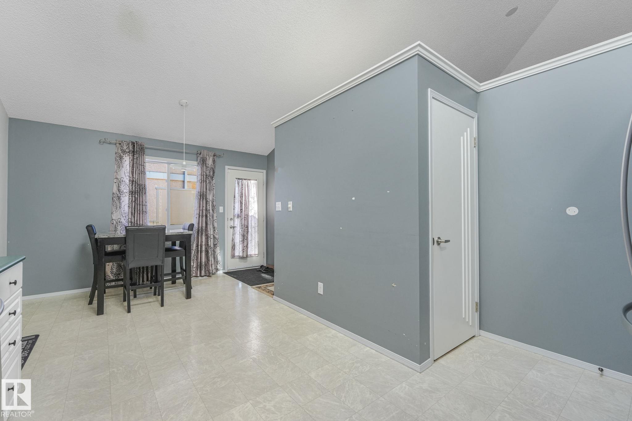 Photo 12 at 11105 9 Avenue NW, Twin Brooks, Edmonton