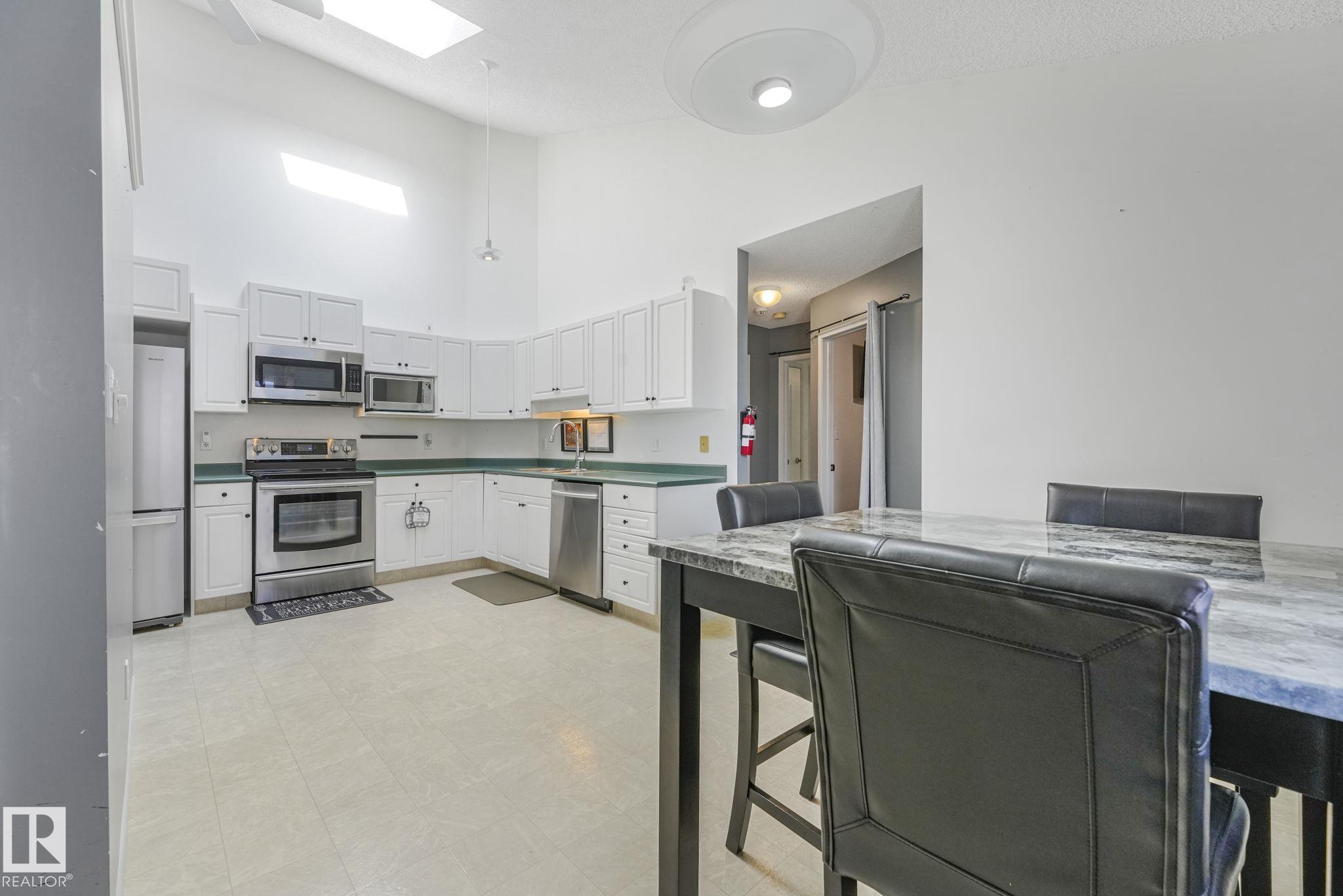 Photo 8 at 11105 9 Avenue NW, Twin Brooks, Edmonton