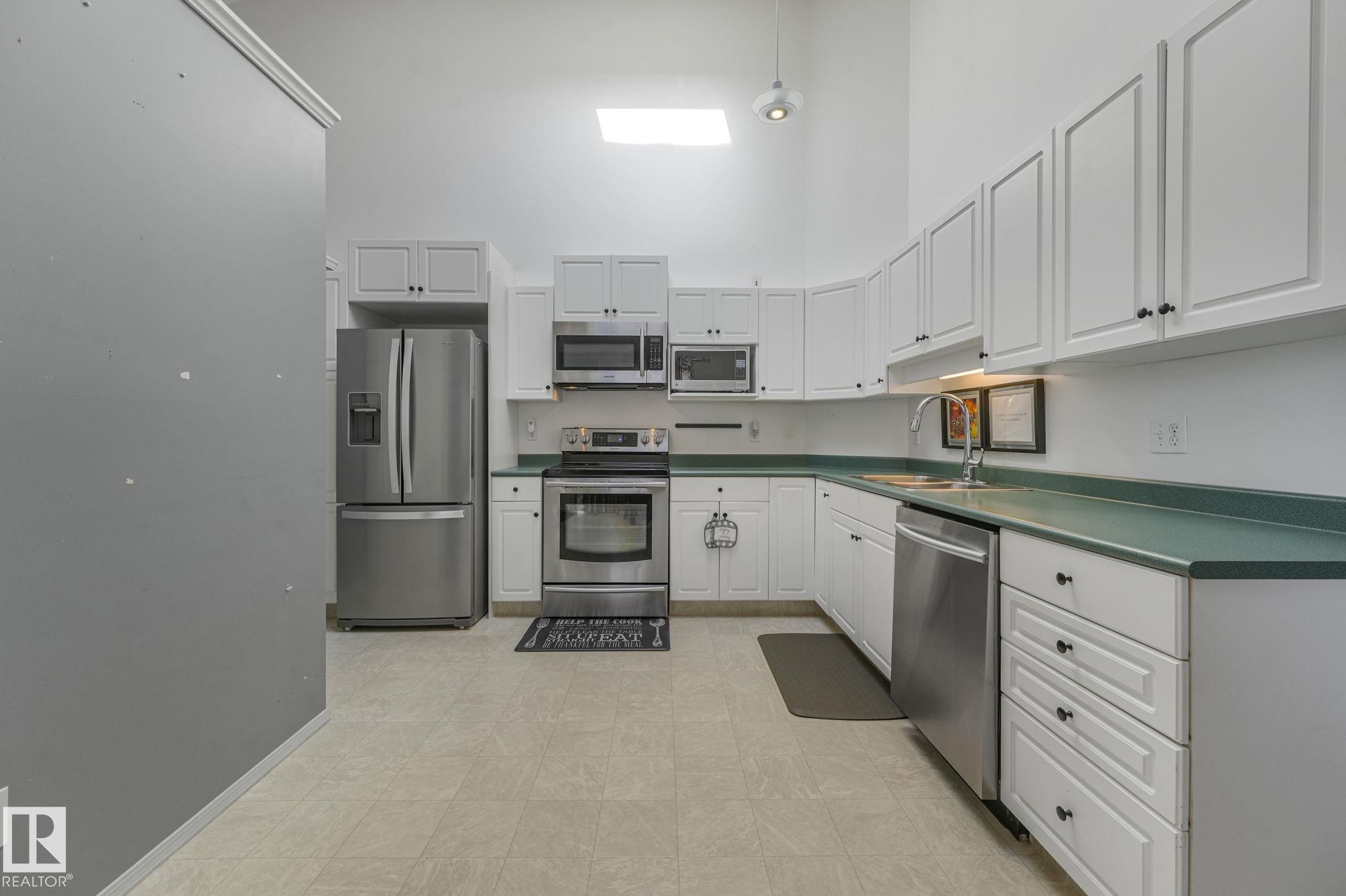 Photo 9 at 11105 9 Avenue NW, Twin Brooks, Edmonton