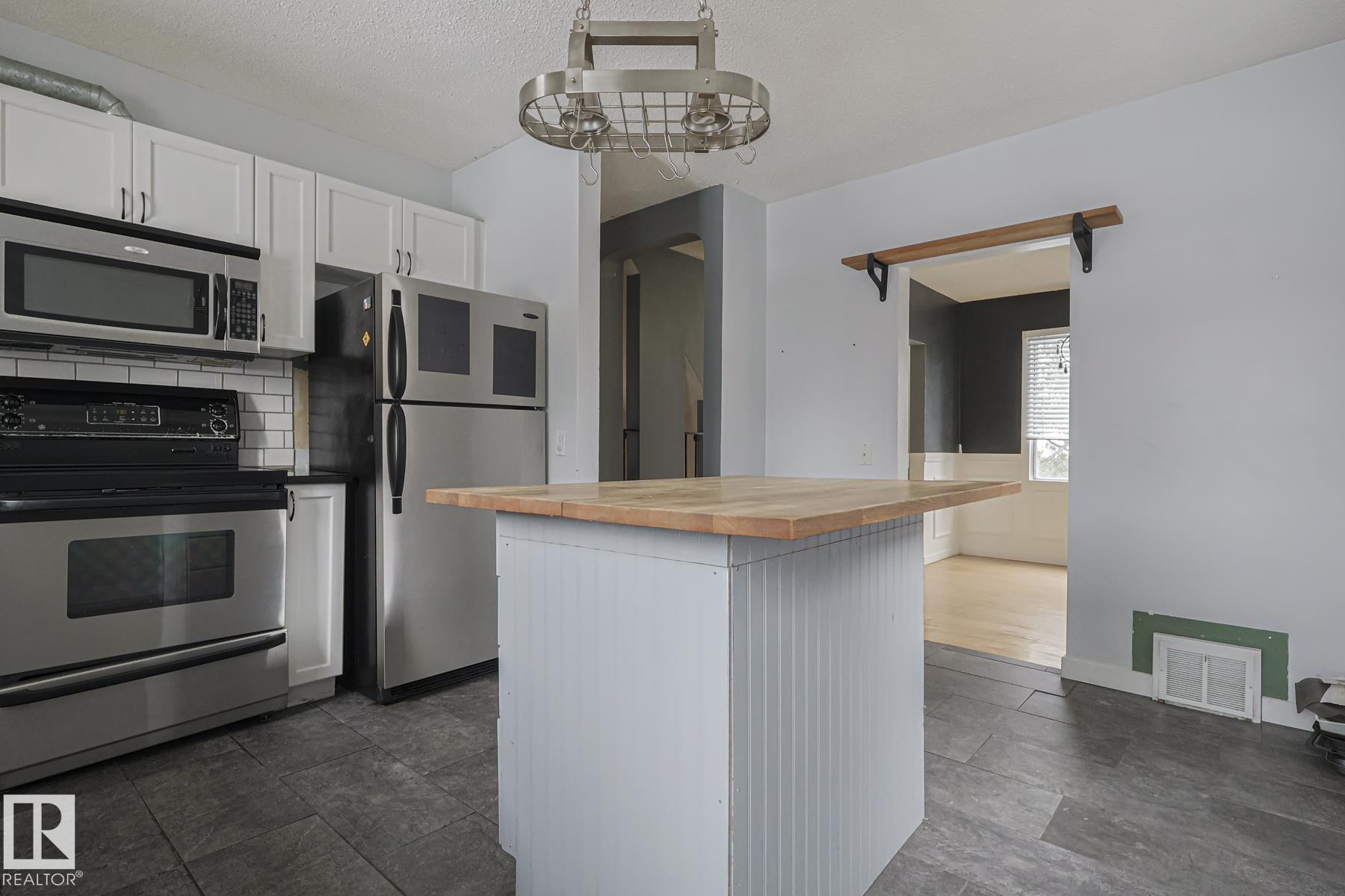 Photo 10 at 13519 107a Avenue NW, North Glenora, Edmonton