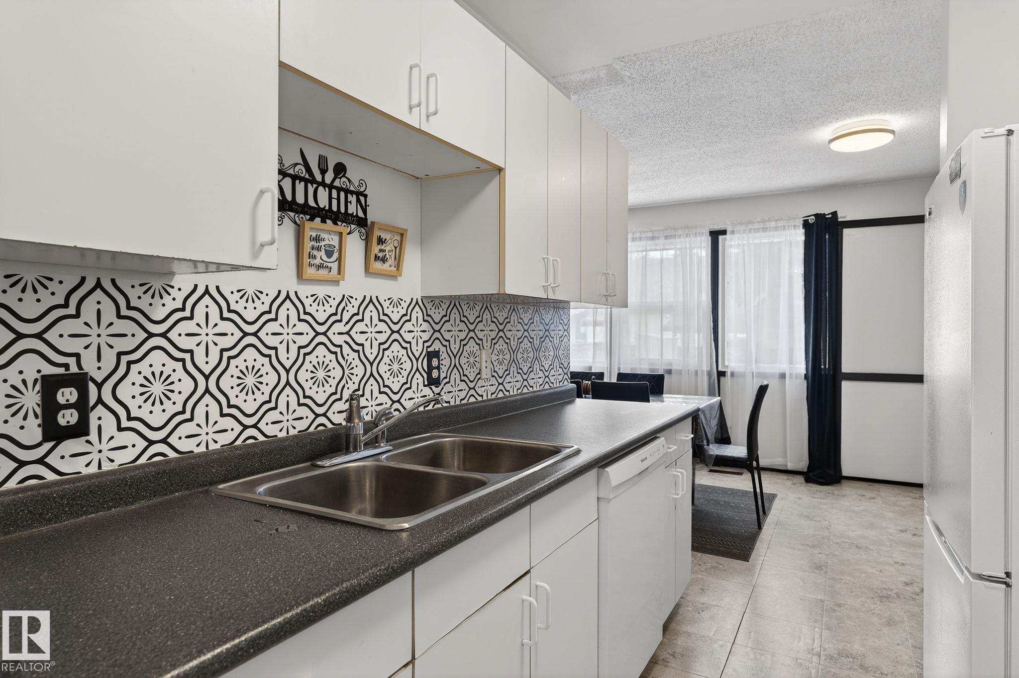 Photo 15 at 105 Village On The Green green NW, York, Edmonton