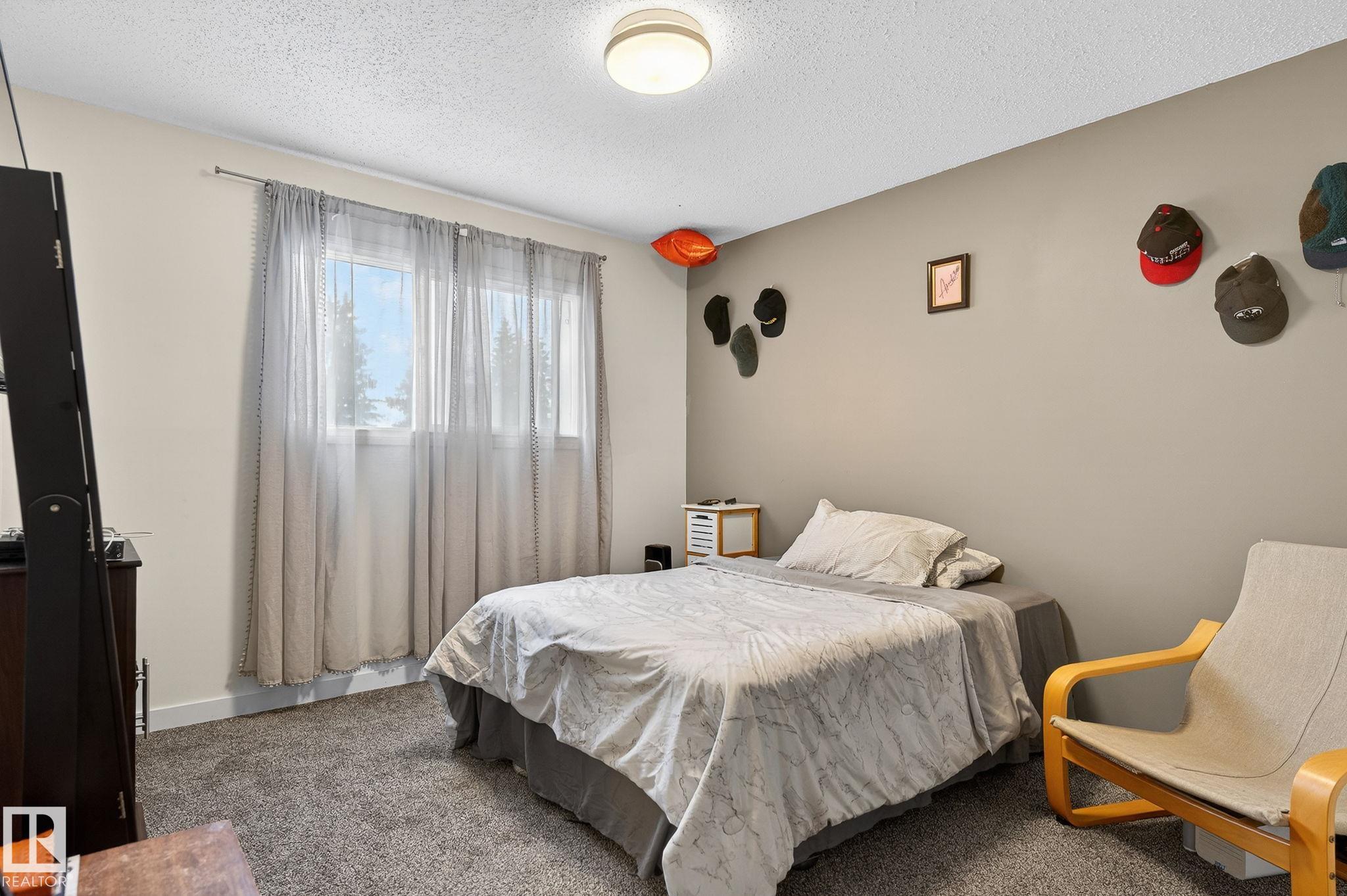 Photo 39 at 105 Village On The Green green NW, York, Edmonton