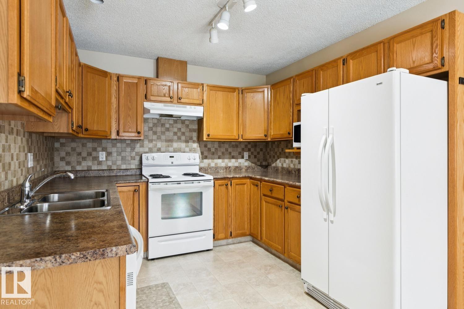 Photo 12 at 38 - 303 Twin Brooks Drive NW, Twin Brooks, Edmonton